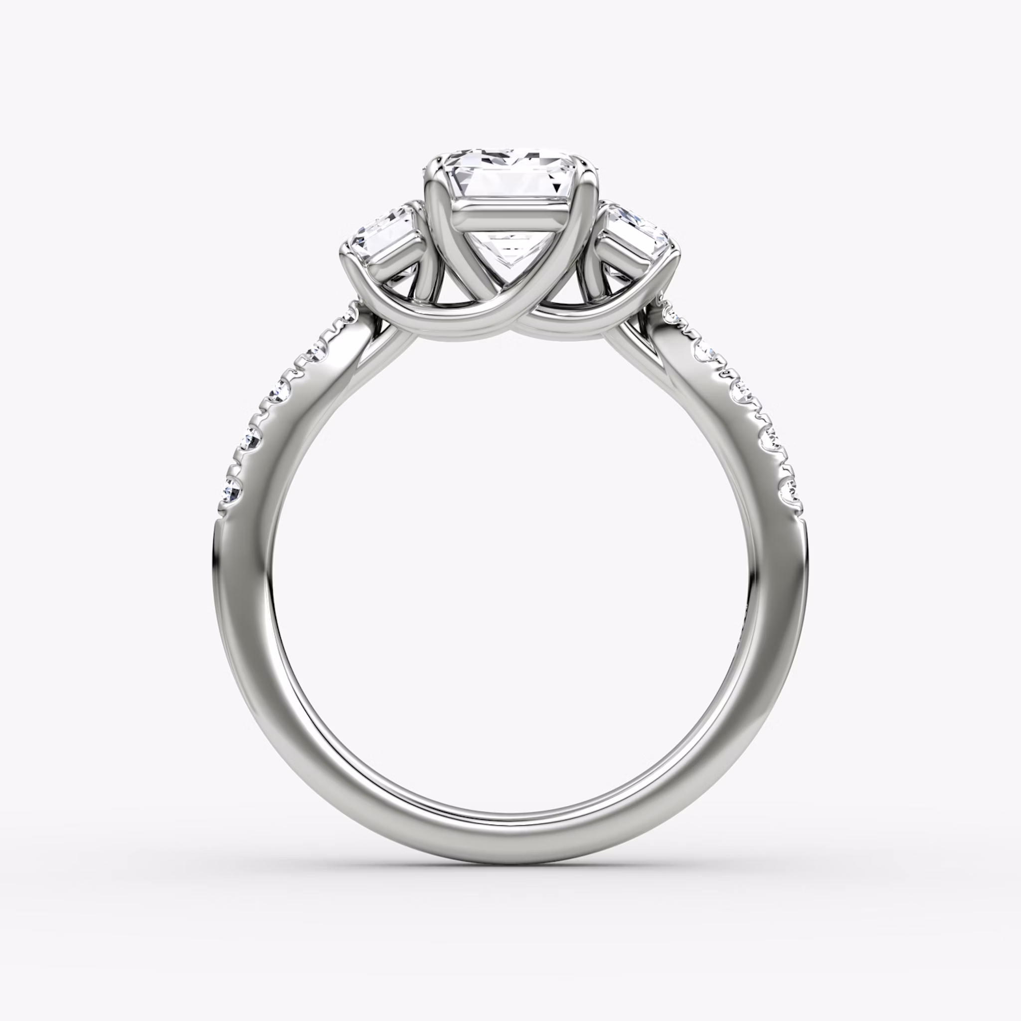 The Trellis Three Stone | Emerald | Platinum | bandAccent: Pavé | diamondOrientation: vertical | caratWeight: other