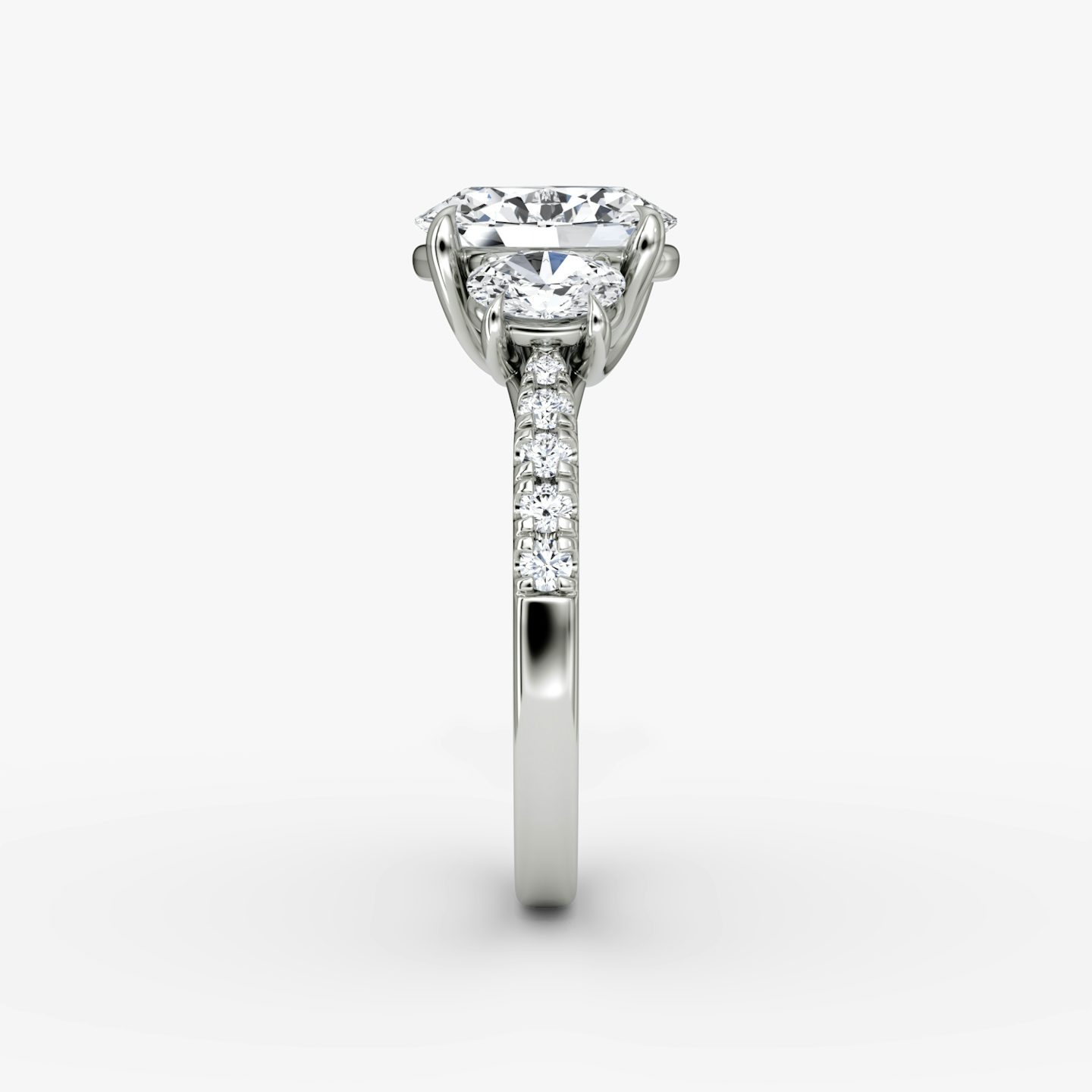 The Trellis Three Stone | Oval | Platinum | bandAccent: Pavé | diamondOrientation: vertical | caratWeight: other