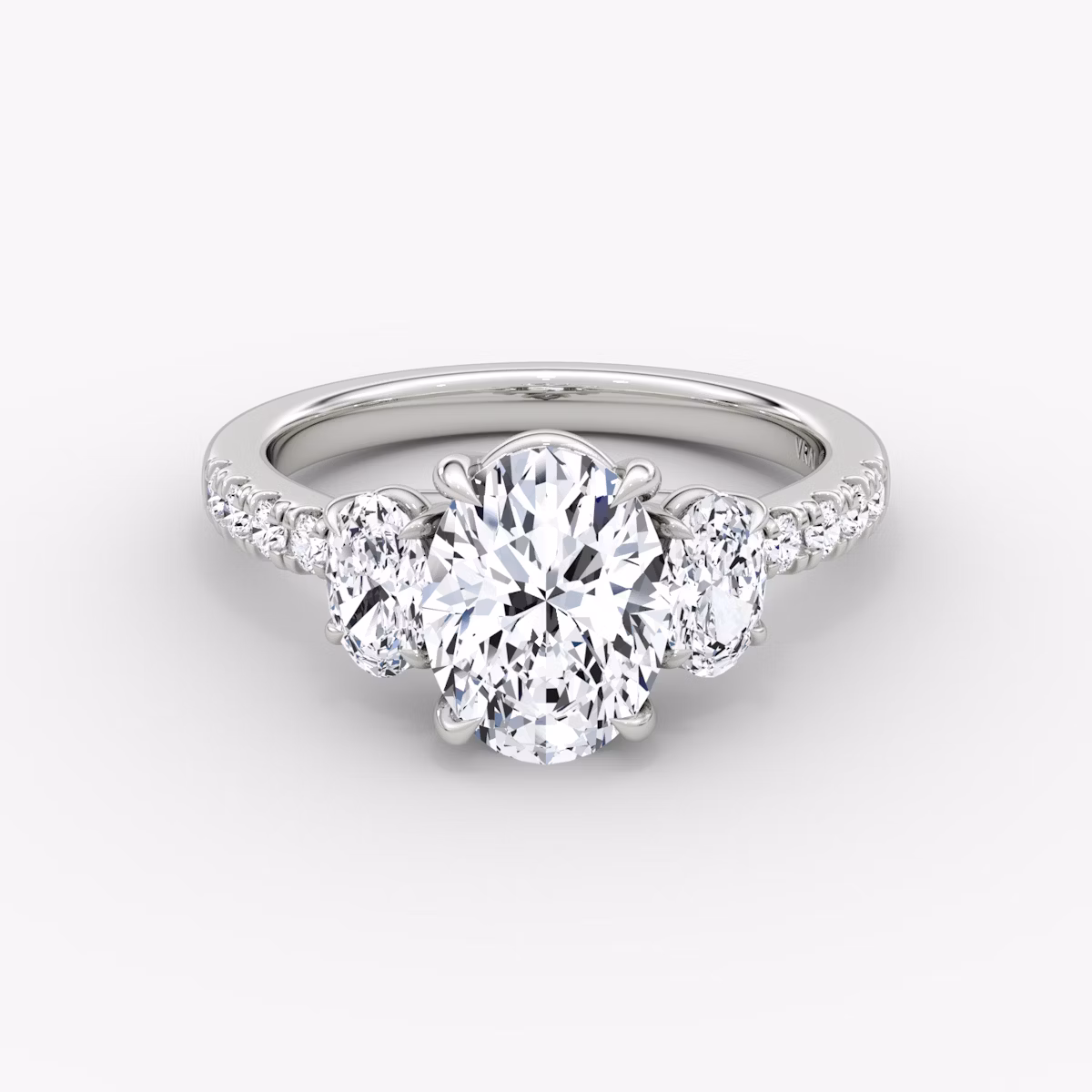The Trellis Three Stone | Oval | 18k | White Gold | bandAccent: Pavé | diamondOrientation: vertical | caratWeight: other