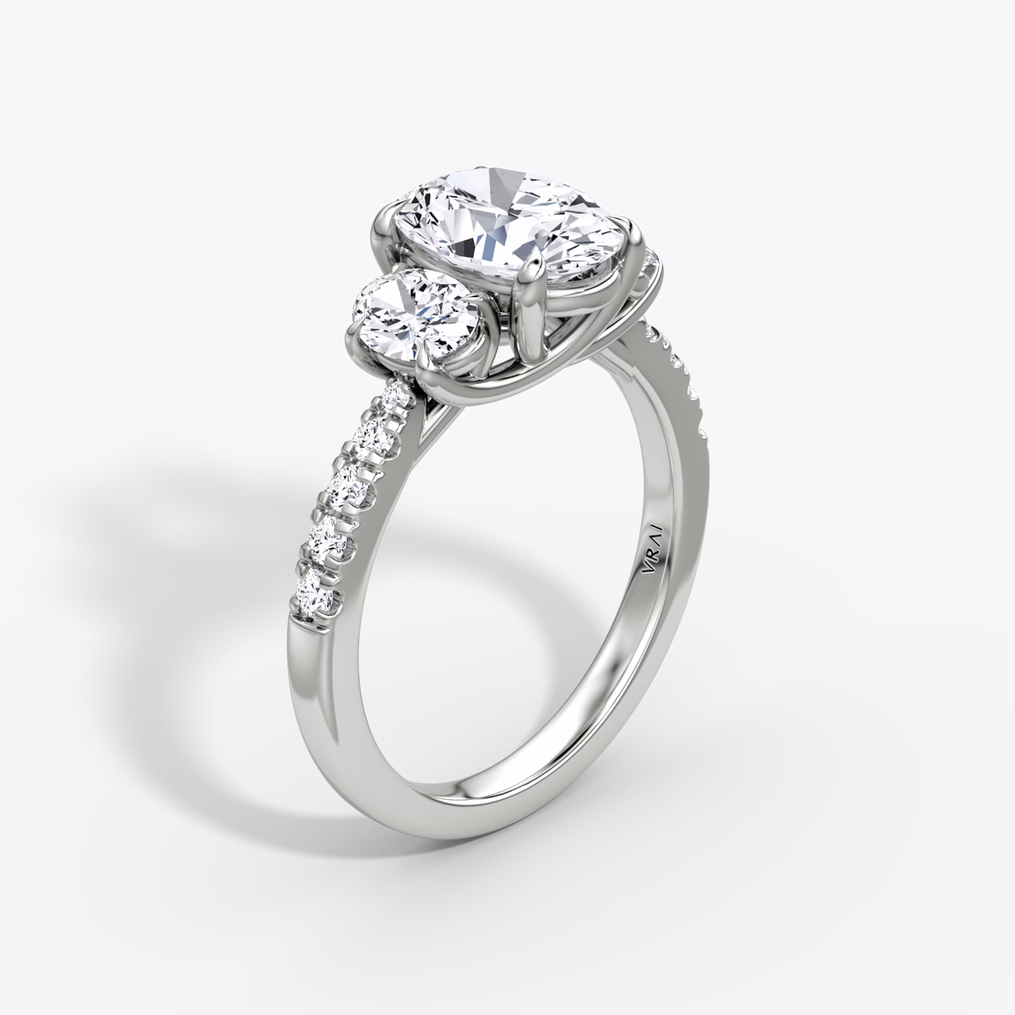 The Trellis Three Stone | Oval | Platinum | bandAccent: Pavé | diamondOrientation: vertical | caratWeight: other