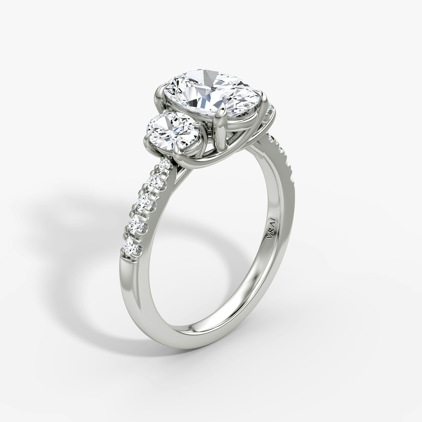 The Trellis Three Stone | Oval | Platinum | bandAccent: Pavé | diamondOrientation: vertical | caratWeight: other