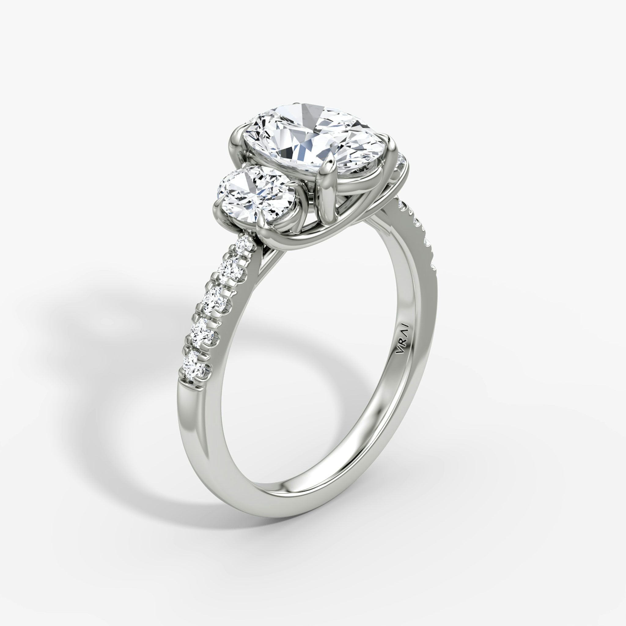 The Trellis Three Stone | Oval | Platinum | bandAccent: Pavé | diamondOrientation: vertical | caratWeight: other