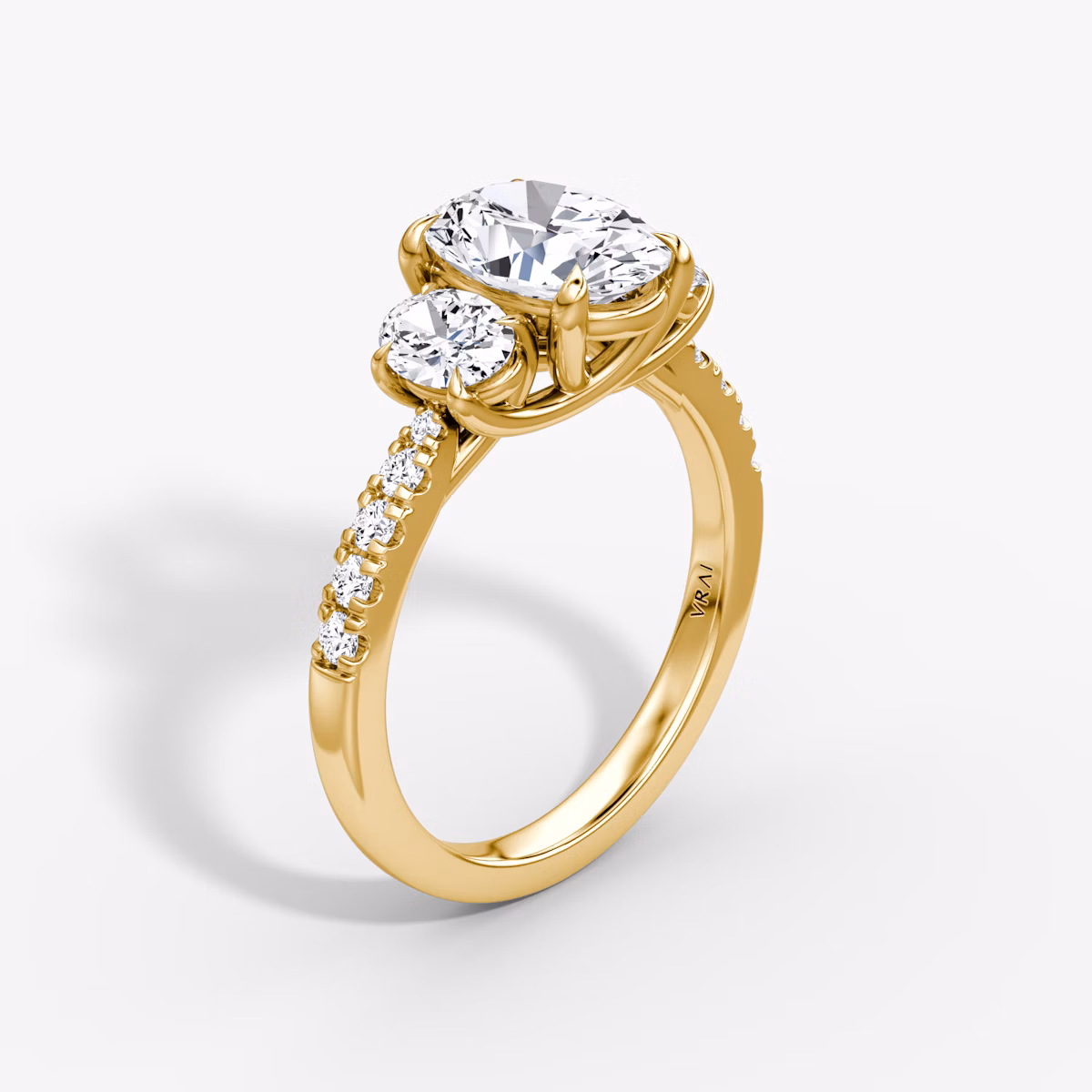 The Trellis Three Stone | Oval | 18k | Yellow Gold | bandAccent: Pavé | diamondOrientation: vertical | caratWeight: other