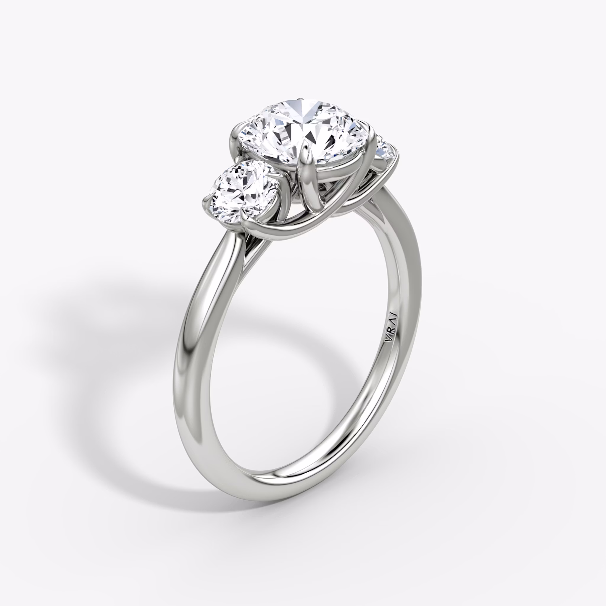 The Trellis Three Stone | Round Brilliant | Platinum | bandAccent: Plain | caratWeight: 1.5ct | diamondOrientation: vertical