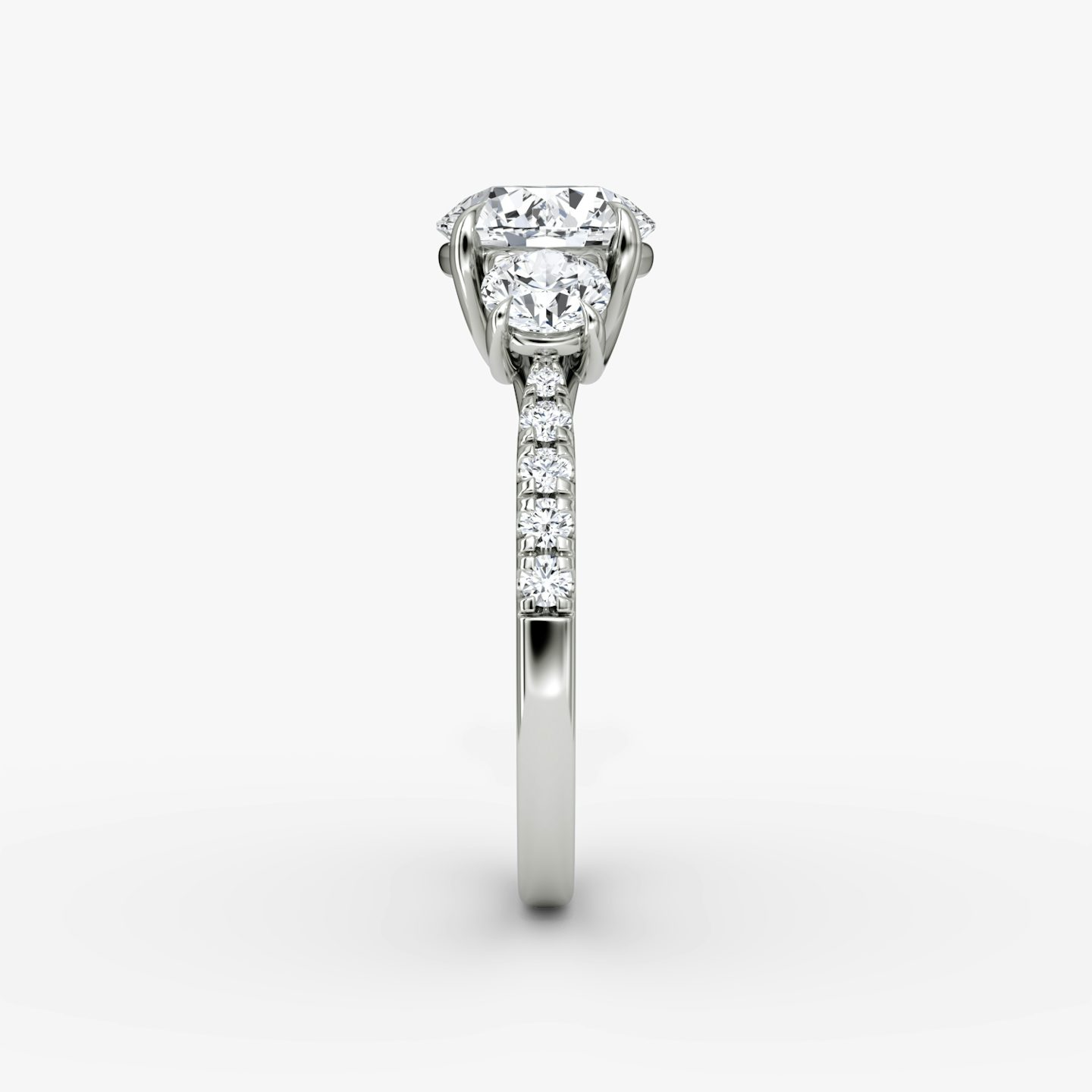 The Trellis Three Stone | Round Brilliant | Platinum | bandAccent: Pavé | caratWeight: 1.0ct | diamondOrientation: vertical