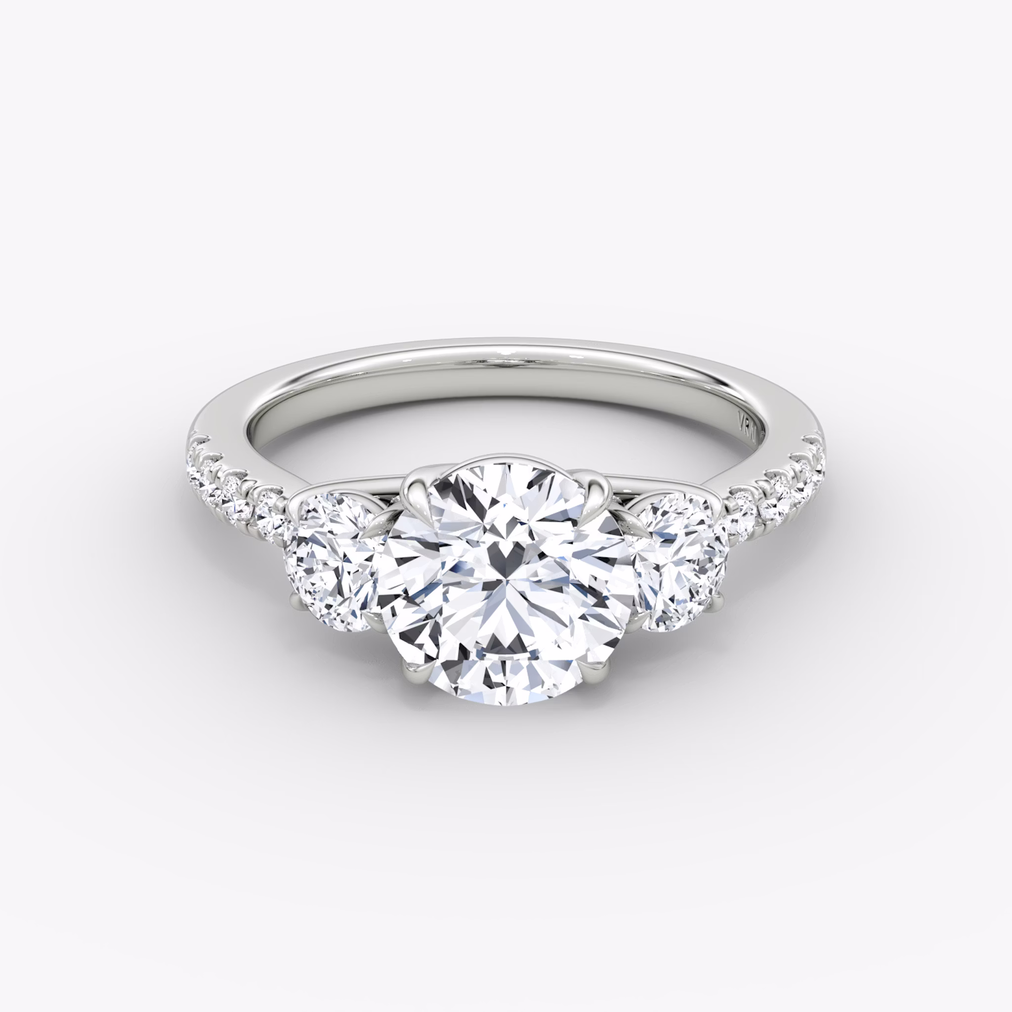 The Trellis Three Stone | Round Brilliant | Platinum | bandAccent: Pavé | caratWeight: other | diamondOrientation: vertical