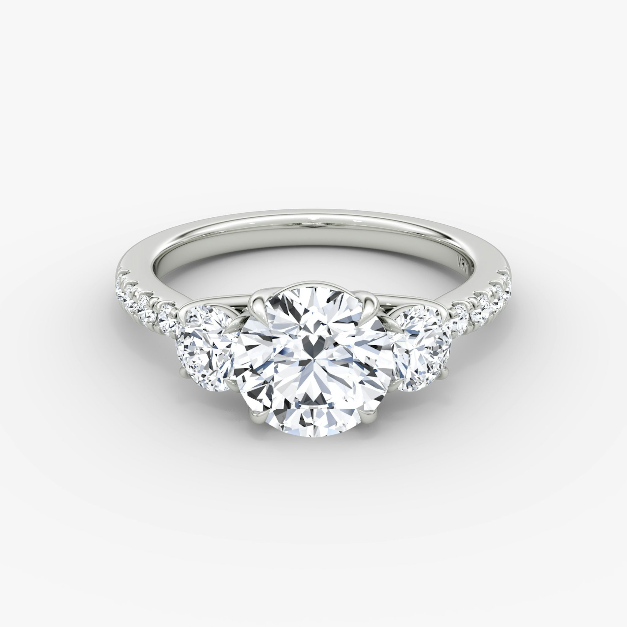 The Trellis Three Stone | Round Brilliant | Platinum | bandAccent: Pavé | caratWeight: other | diamondOrientation: vertical