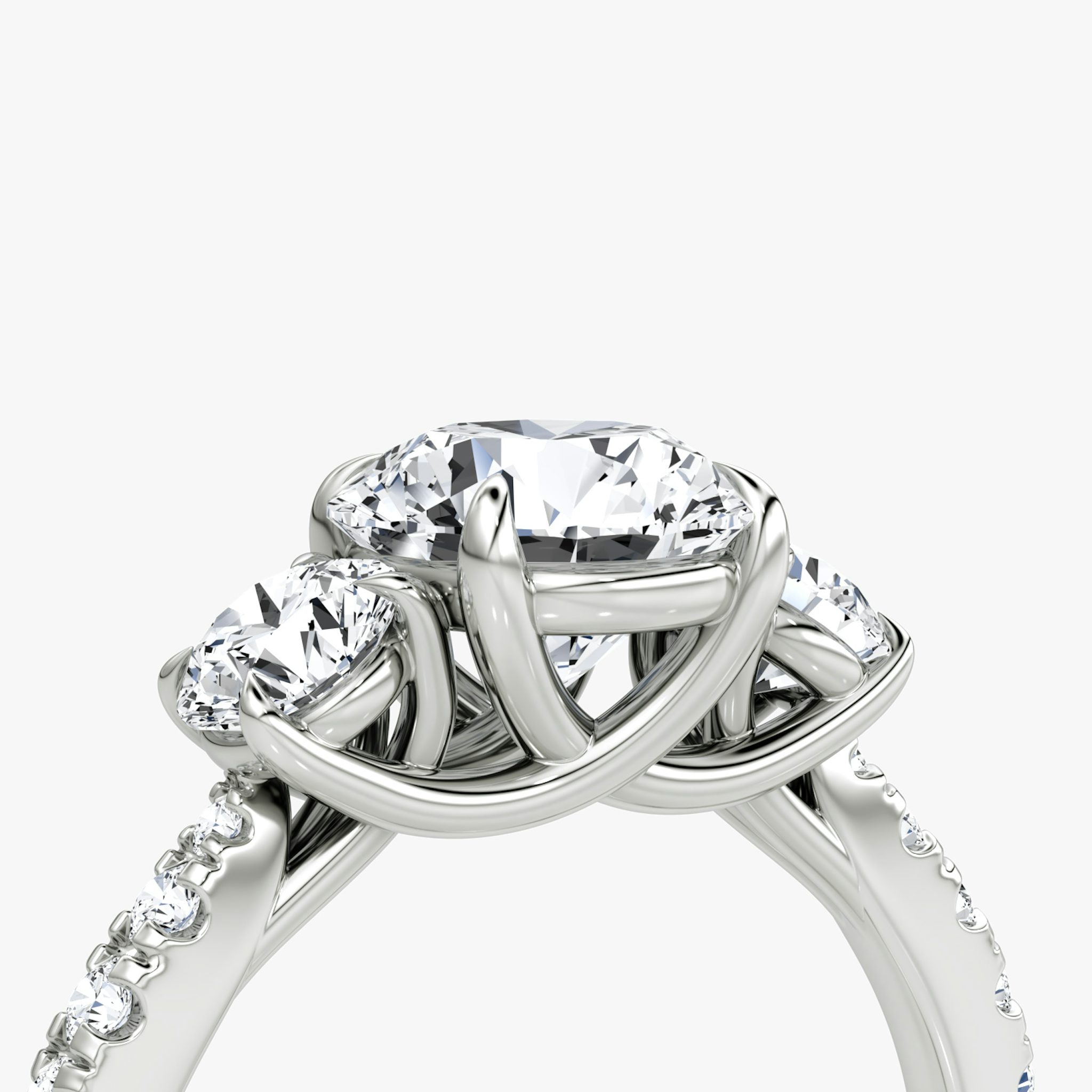 The Trellis Three Stone | Round Brilliant | Platinum | bandAccent: Pavé | caratWeight: other | diamondOrientation: vertical