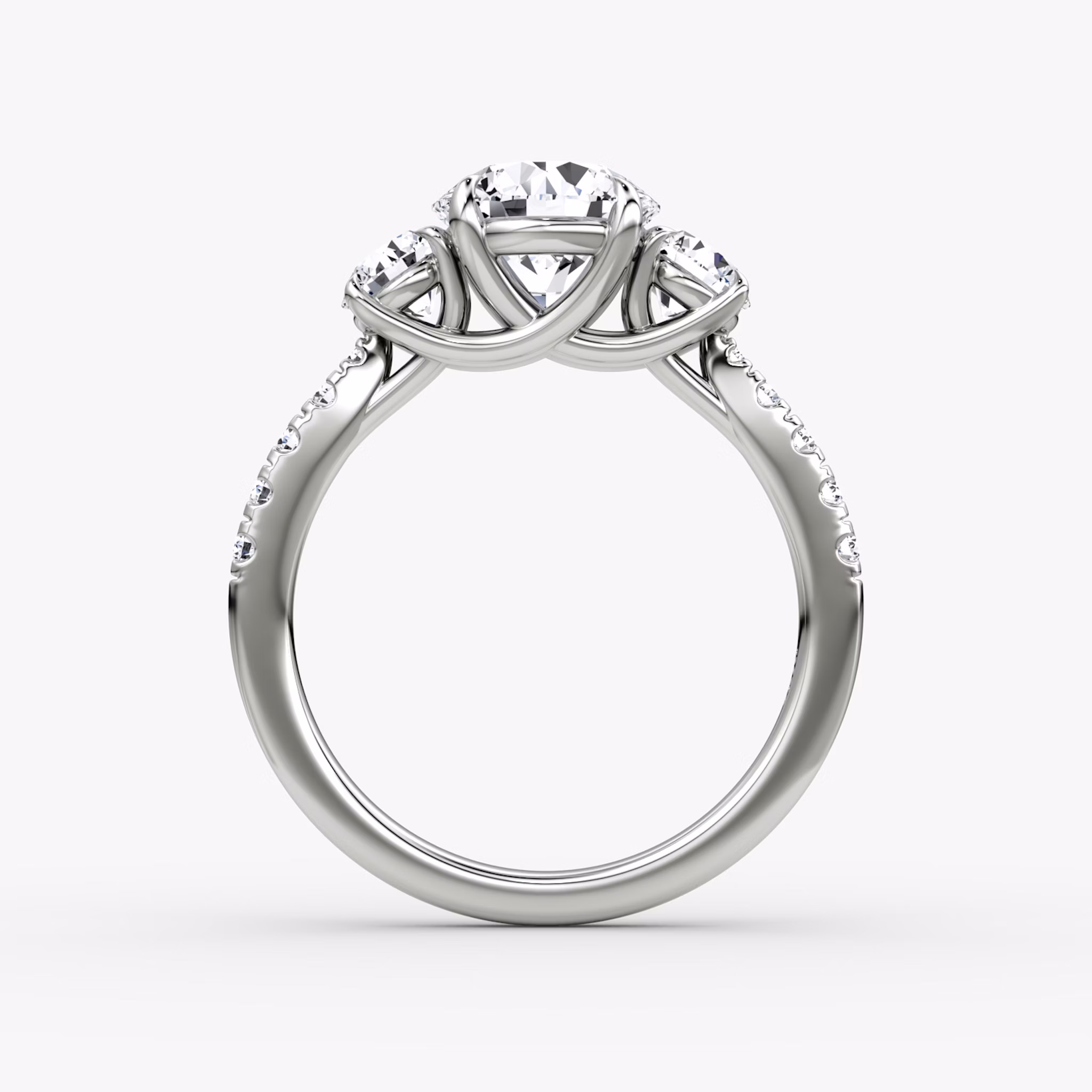 The Trellis Three Stone | Round Brilliant | Platinum | bandAccent: Pavé | caratWeight: other | diamondOrientation: vertical