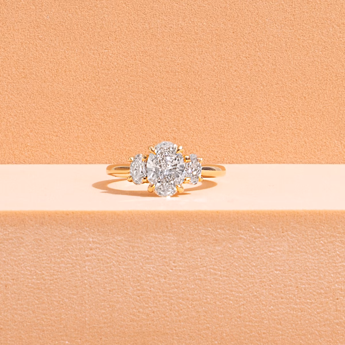 The Trellis Three Stone | Oval | 18k | White Gold | bandAccent: Plain | diamondOrientation: vertical | caratWeight: other
