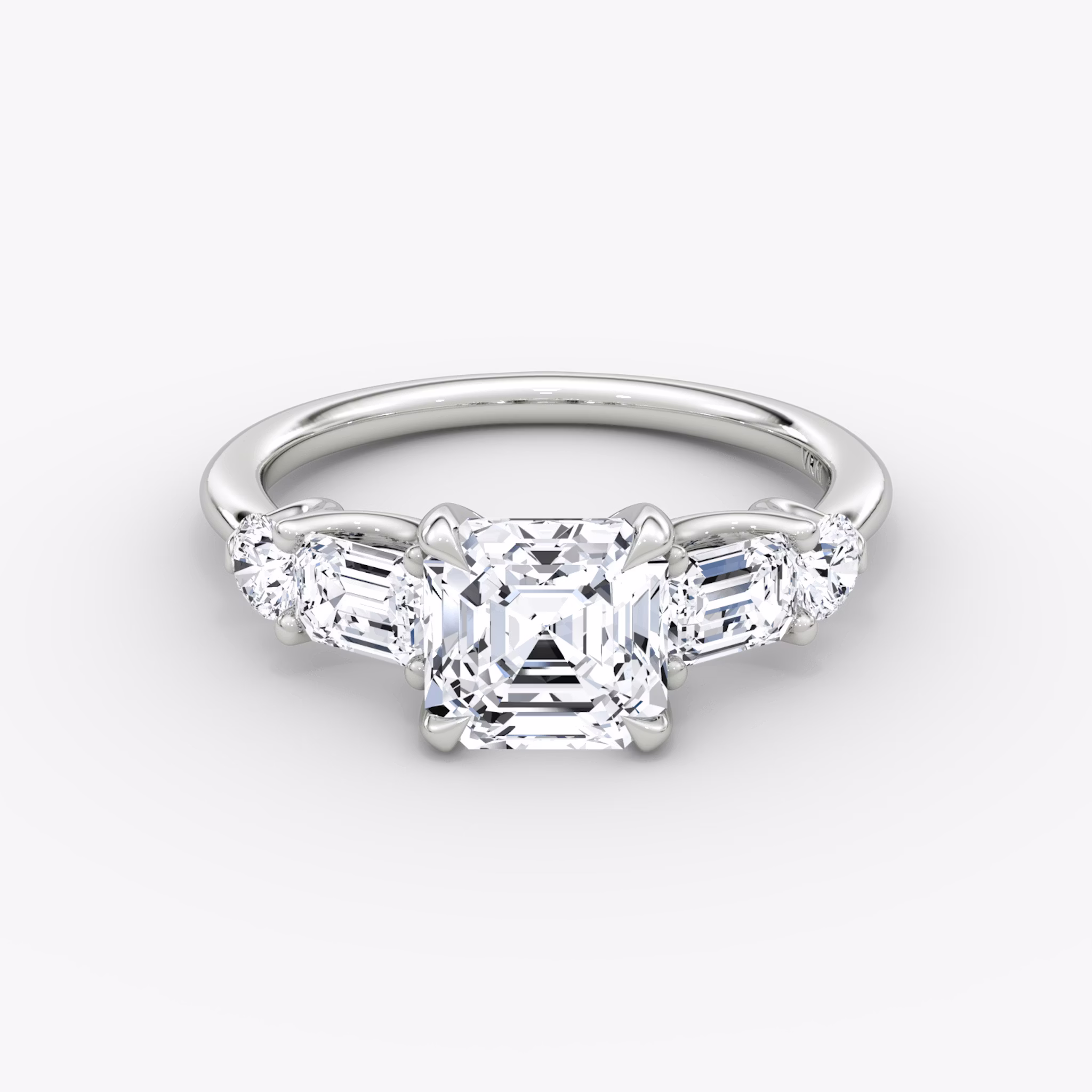 The Mixed Shape | Asscher | 18k | White Gold | bandAccent: Plain | sideStoneOrientation: horizontal | sideStoneShape: Emerald and Round Brilliant | diamondOrientation: vertical | caratWeight: other