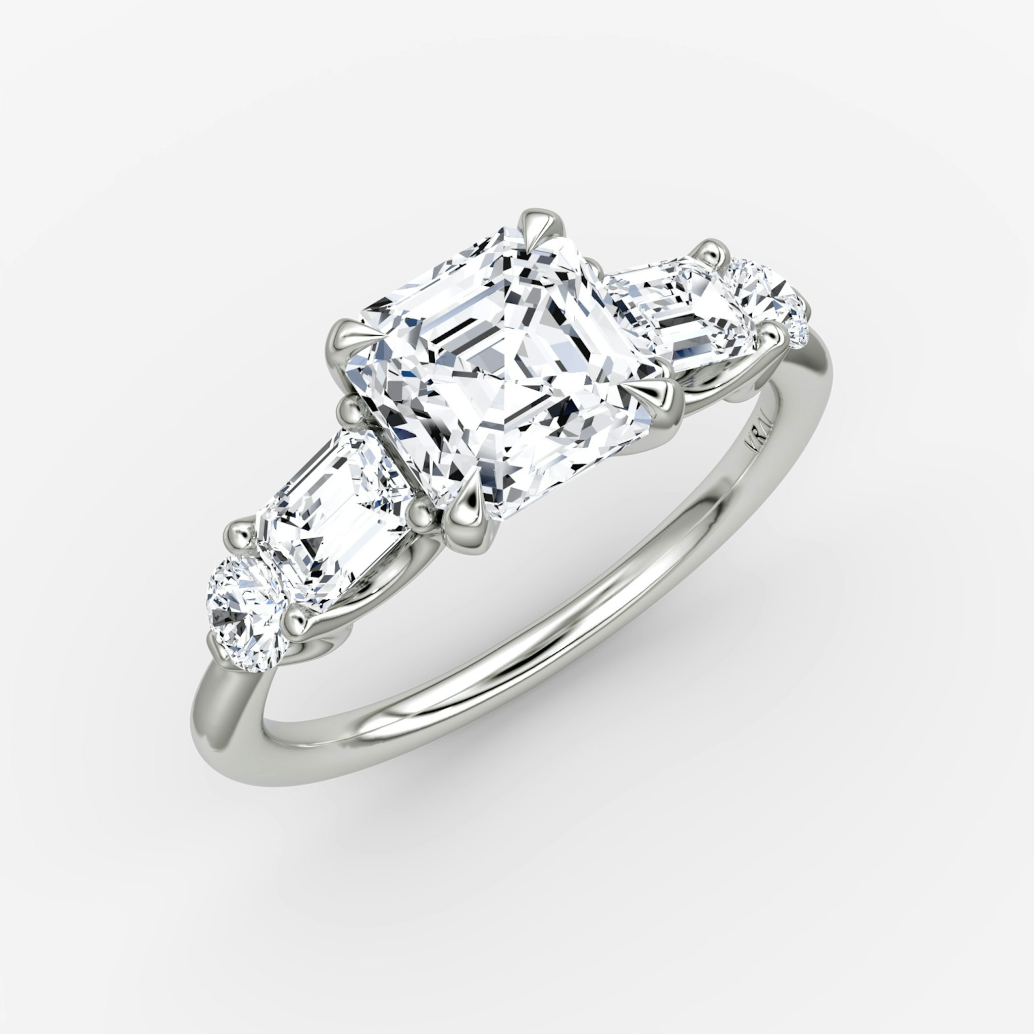 The Mixed Shape | Asscher | 18k | White Gold | bandAccent: Plain | sideStoneOrientation: horizontal | sideStoneShape: Emerald and Round Brilliant | diamondOrientation: vertical | caratWeight: other