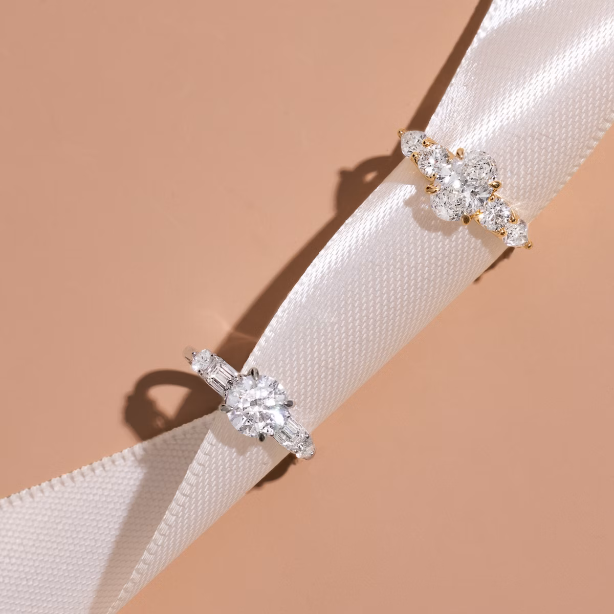 The Mixed Shape | Radiant | 18k | Yellow Gold | bandAccent: Plain | sideStoneOrientation: horizontal | sideStoneShape: Emerald and Round Brilliant | diamondOrientation: vertical | caratWeight: other