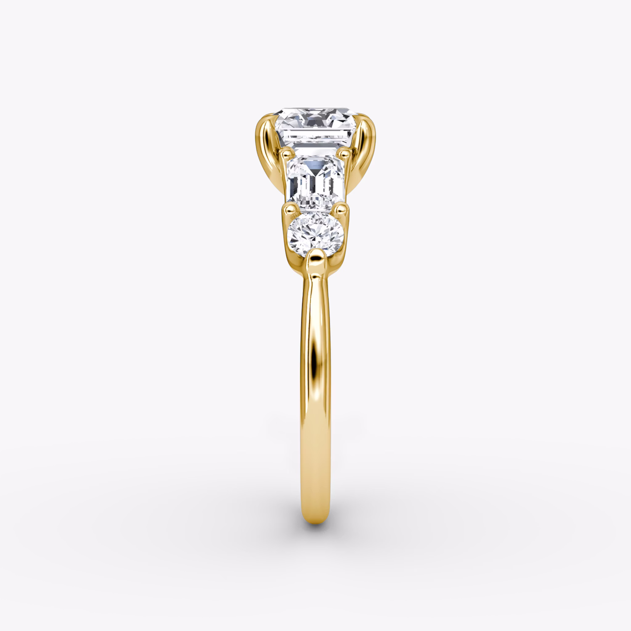 The Mixed Shape | Asscher | 18k | Yellow Gold | bandAccent: Plain | sideStoneOrientation: horizontal | sideStoneShape: Emerald and Round Brilliant | diamondOrientation: vertical | caratWeight: other