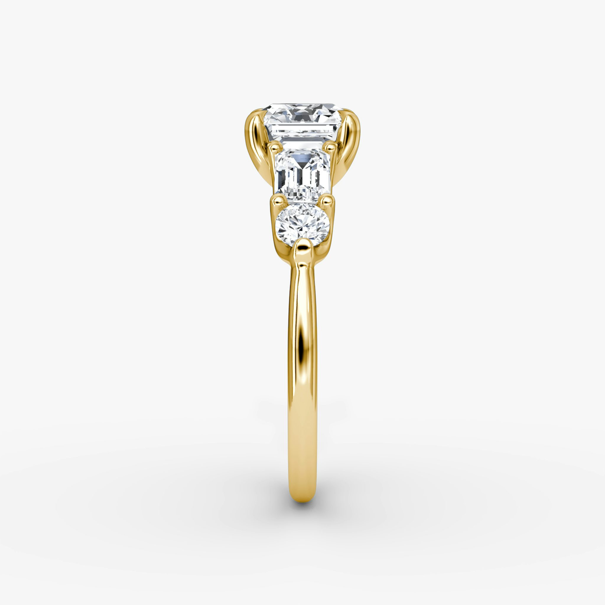 The Mixed Shape | Asscher | 18k | Yellow Gold | bandAccent: Plain | sideStoneOrientation: horizontal | sideStoneShape: Emerald and Round Brilliant | diamondOrientation: vertical | caratWeight: other
