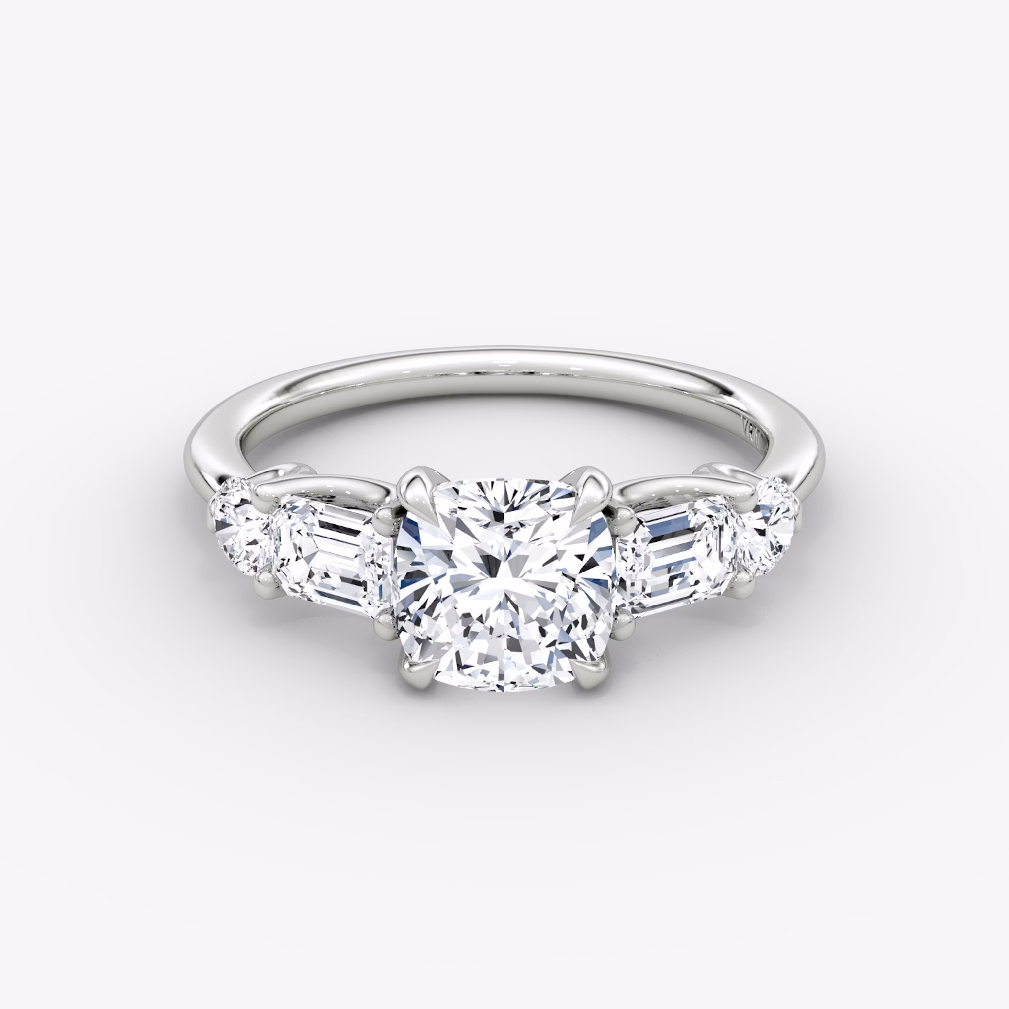 The Mixed Shape | Cushion | 18k | White Gold | bandAccent: Plain | sideStoneOrientation: horizontal | sideStoneShape: Emerald and Round Brilliant | diamondOrientation: vertical | caratWeight: other