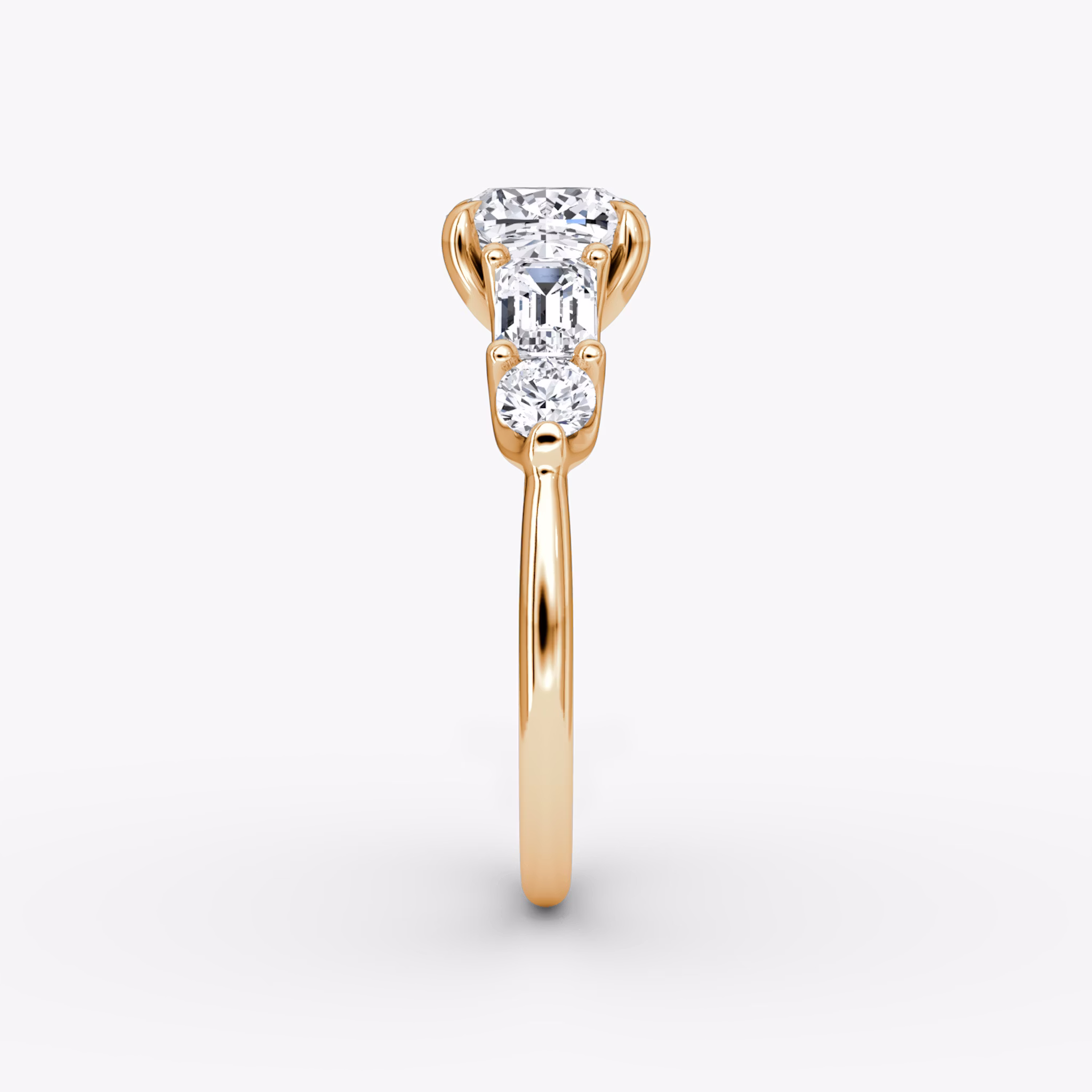 The Mixed Shape | Cushion | 14k | Rose Gold | bandAccent: Plain | sideStoneOrientation: horizontal | sideStoneShape: Emerald and Round Brilliant | diamondOrientation: vertical | caratWeight: other