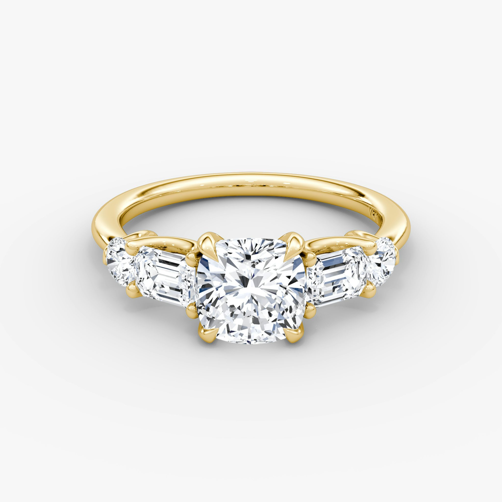 The Mixed Shape | Cushion | 18k | Yellow Gold | bandAccent: Plain | sideStoneOrientation: horizontal | sideStoneShape: Emerald and Round Brilliant | diamondOrientation: vertical | caratWeight: other