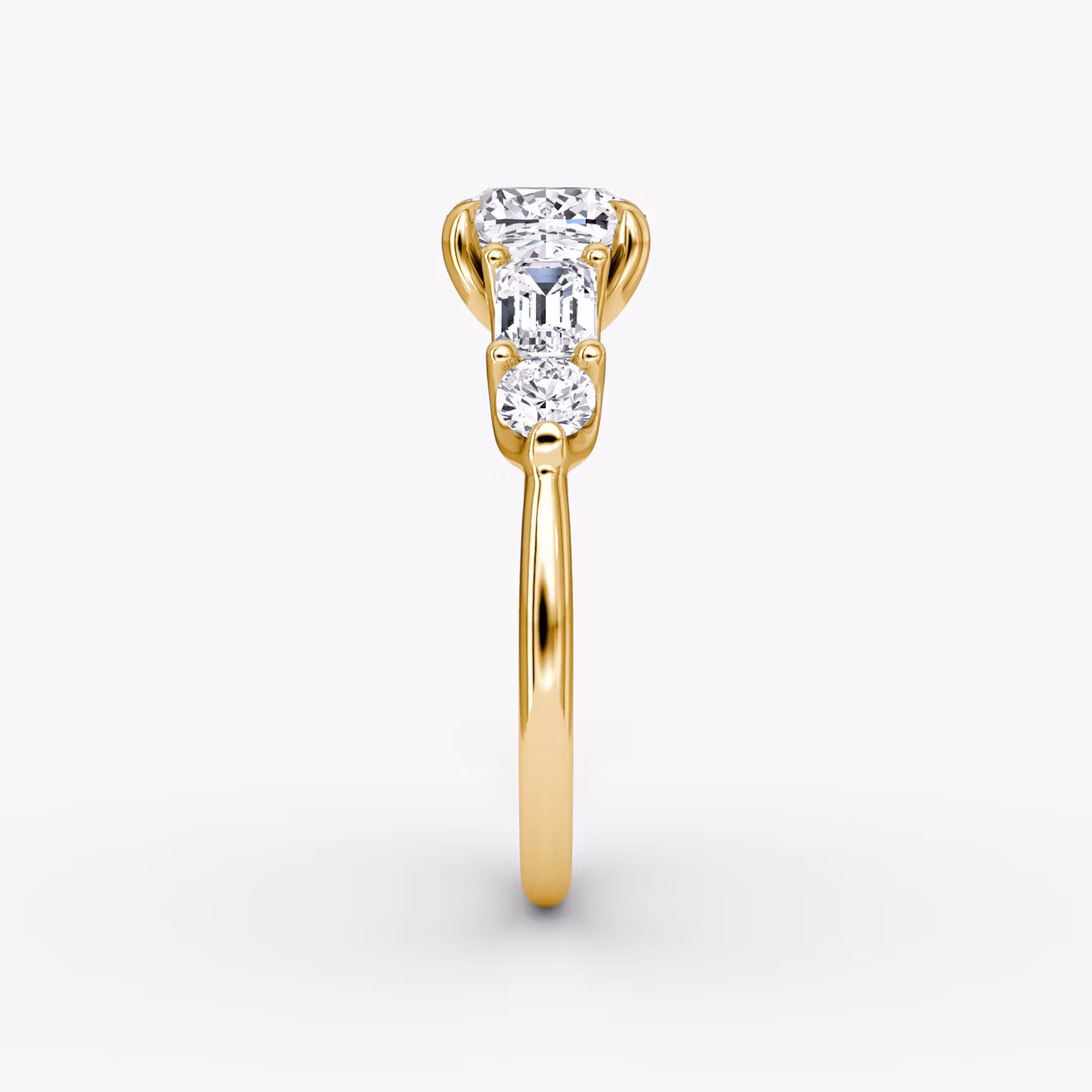 The Mixed Shape | Cushion | 18k | Yellow Gold | bandAccent: Plain | sideStoneOrientation: horizontal | sideStoneShape: Emerald and Round Brilliant | diamondOrientation: vertical | caratWeight: other