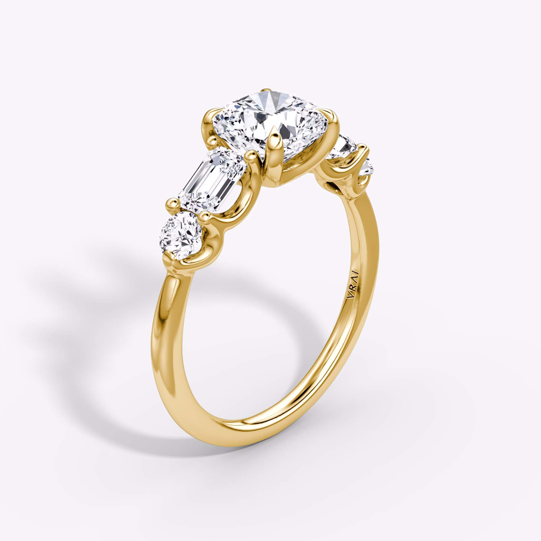 The Mixed Shape | Cushion | 18k | Yellow Gold | bandAccent: Plain | sideStoneOrientation: horizontal | sideStoneShape: Emerald and Round Brilliant | diamondOrientation: vertical | caratWeight: other