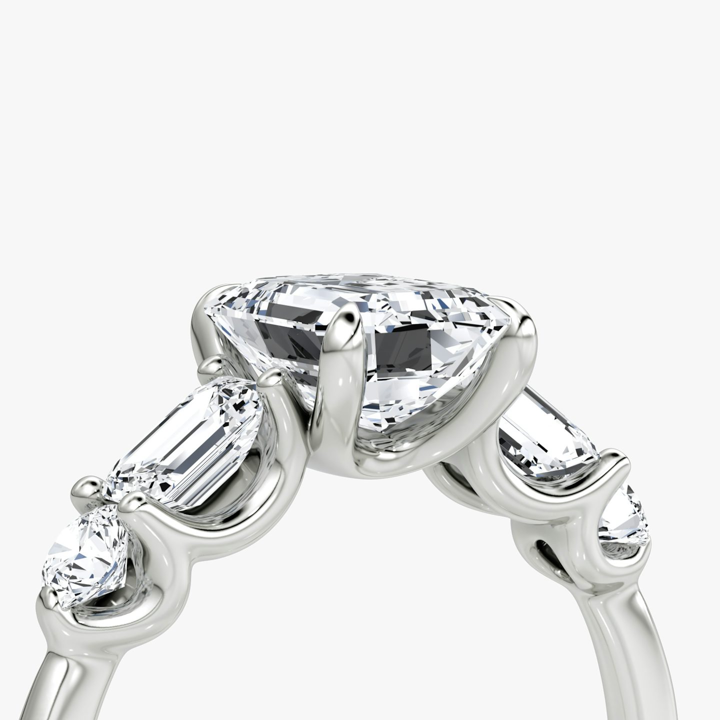 The Mixed Shape | Emerald | Platinum | bandAccent: Plain | sideStoneOrientation: horizontal | sideStoneShape: Emerald and Round Brilliant | diamondOrientation: vertical | caratWeight: other