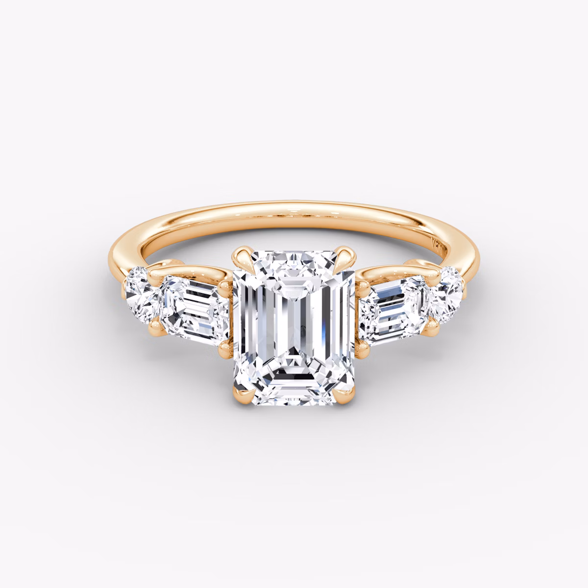 The Mixed Shape | Emerald | 14k | Rose Gold | bandAccent: Plain | sideStoneOrientation: horizontal | sideStoneShape: Emerald and Round Brilliant | diamondOrientation: vertical | caratWeight: other