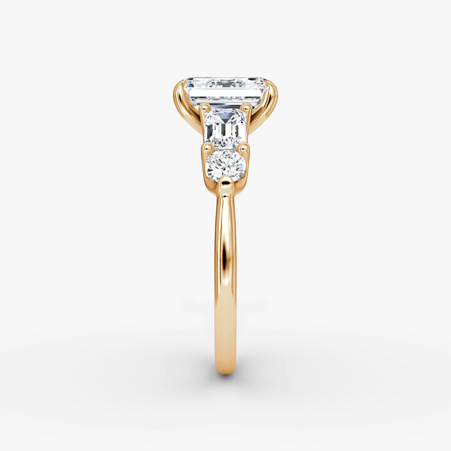 The Mixed Shape | Emerald | 14k | Rose Gold | bandAccent: Plain | sideStoneOrientation: horizontal | sideStoneShape: Emerald and Round Brilliant | diamondOrientation: vertical | caratWeight: other