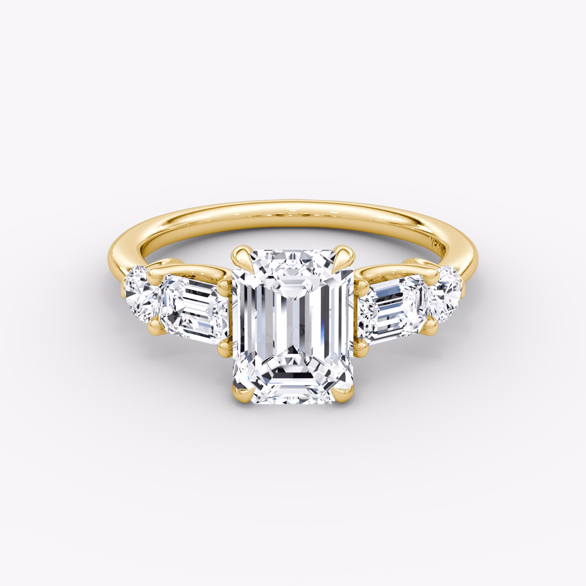 The Mixed Shape | Emerald | 18k | Yellow Gold | bandAccent: Plain | sideStoneOrientation: horizontal | sideStoneShape: Emerald and Round Brilliant | diamondOrientation: vertical | caratWeight: other