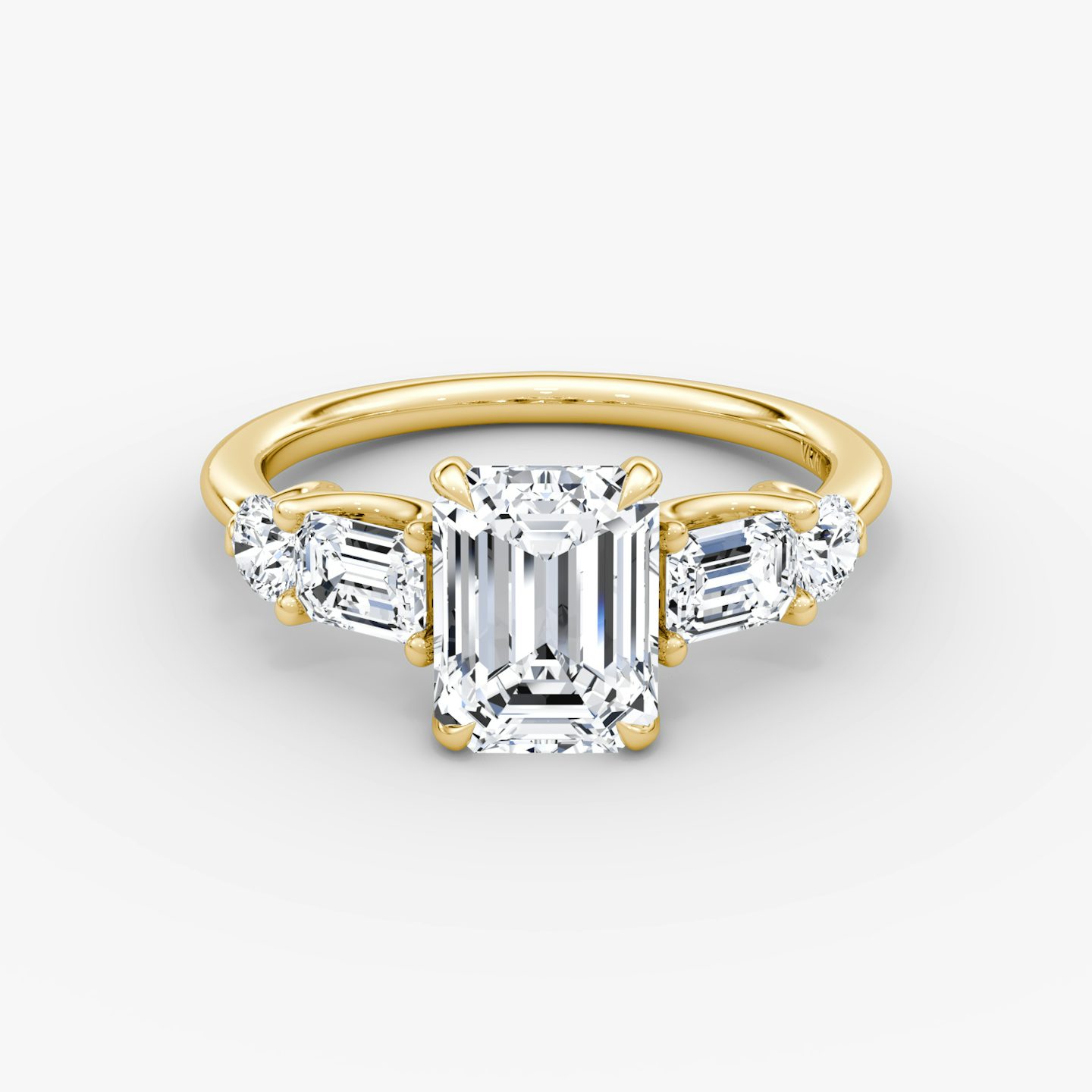 The Mixed Shape | Emerald | 18k | Yellow Gold | bandAccent: Plain | sideStoneOrientation: horizontal | sideStoneShape: Emerald and Round Brilliant | diamondOrientation: vertical | caratWeight: other