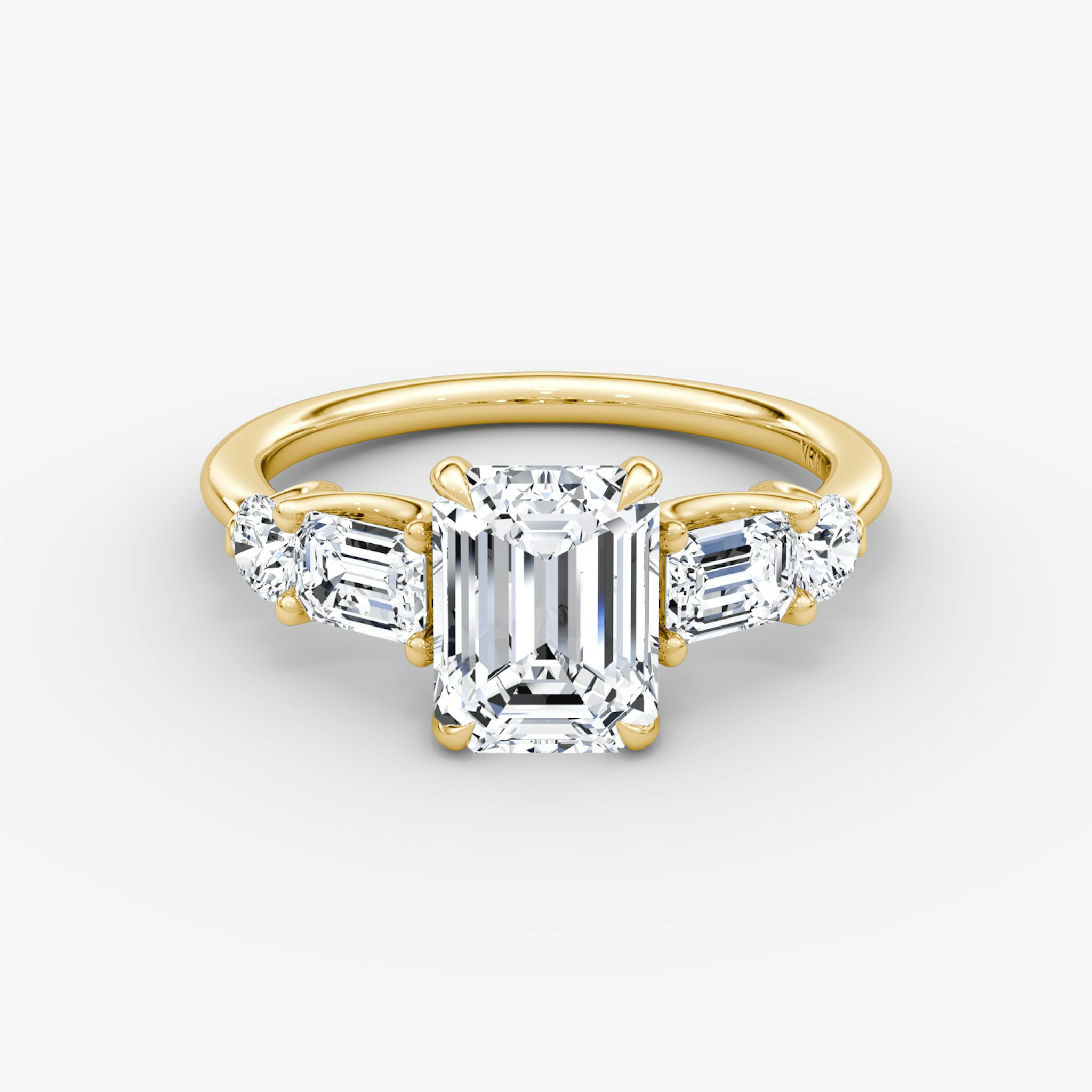 The Mixed Shape | Emerald | 18k | Yellow Gold | bandAccent: Plain | sideStoneOrientation: horizontal | sideStoneShape: Emerald and Round Brilliant | diamondOrientation: vertical | caratWeight: other