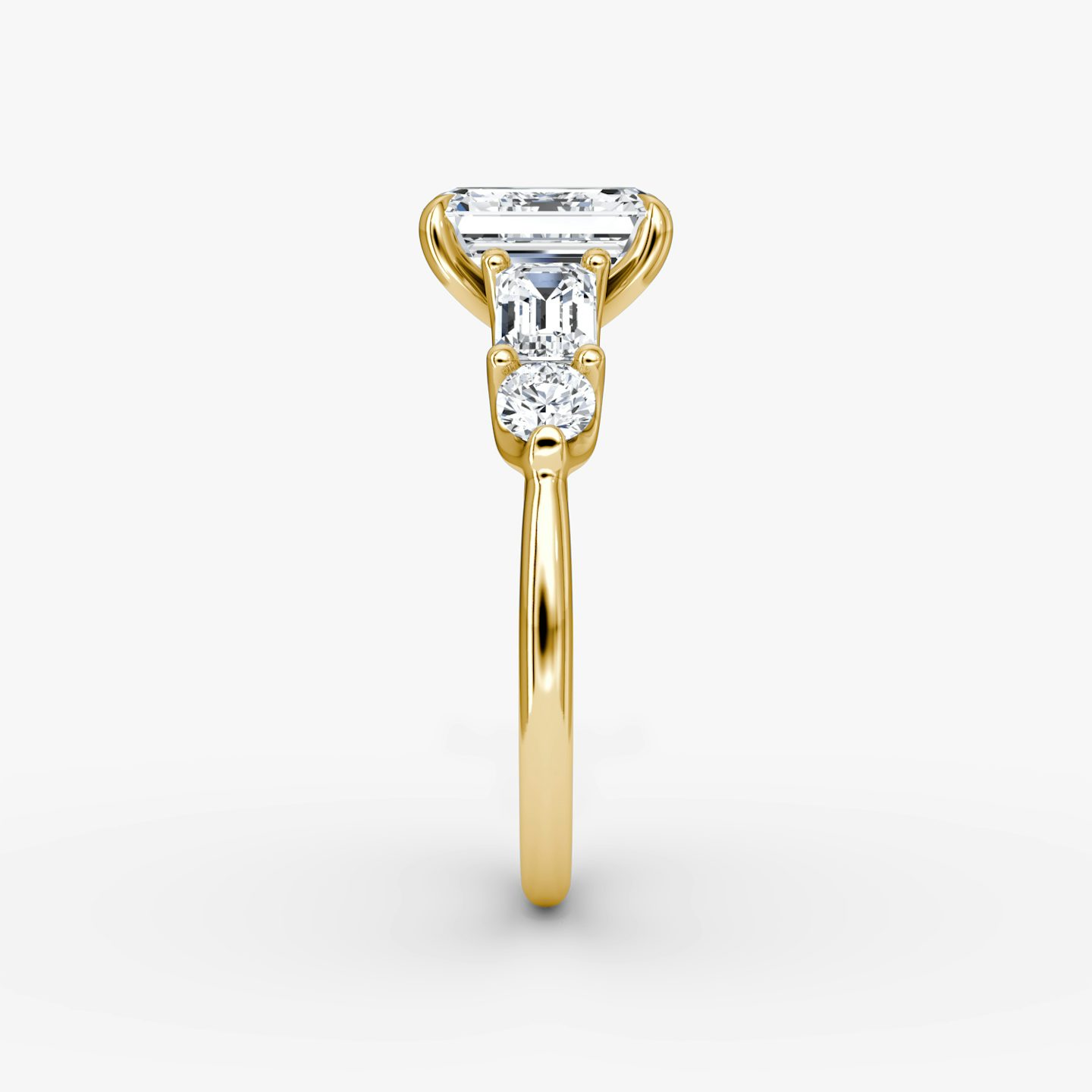 The Mixed Shape | Emerald | 18k | Yellow Gold | bandAccent: Plain | sideStoneOrientation: horizontal | sideStoneShape: Emerald and Round Brilliant | diamondOrientation: vertical | caratWeight: other