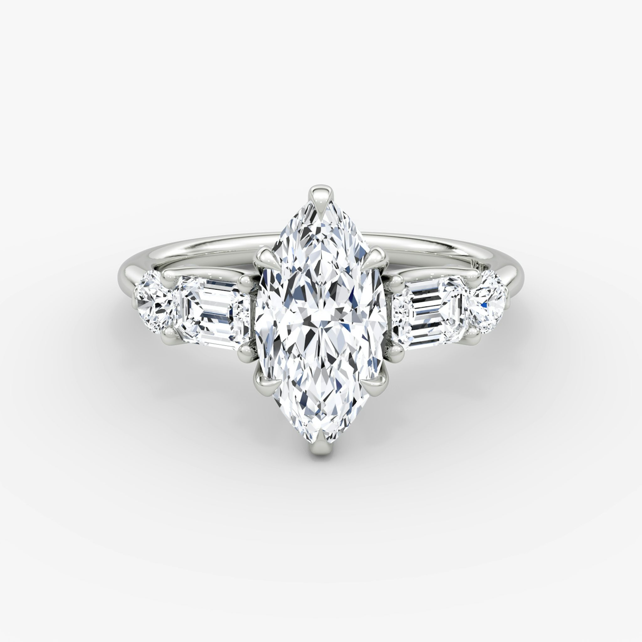 The Mixed Shape | Marquise | 18k | White Gold | bandAccent: Plain | sideStoneOrientation: horizontal | sideStoneShape: Emerald and Round Brilliant | diamondOrientation: vertical | caratWeight: other