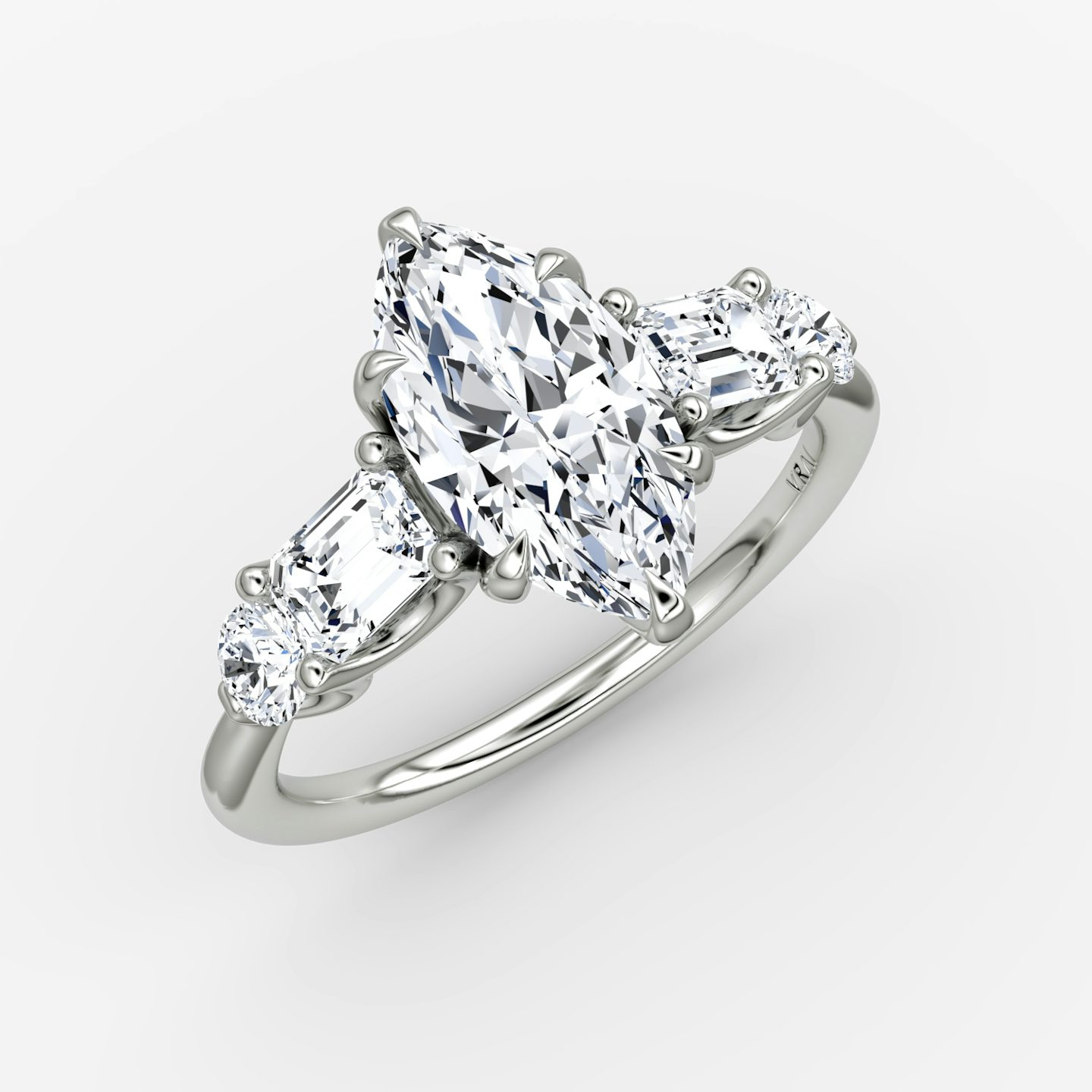 The Mixed Shape | Marquise | Platinum | bandAccent: Plain | sideStoneOrientation: horizontal | sideStoneShape: Emerald and Round Brilliant | diamondOrientation: vertical | caratWeight: other
