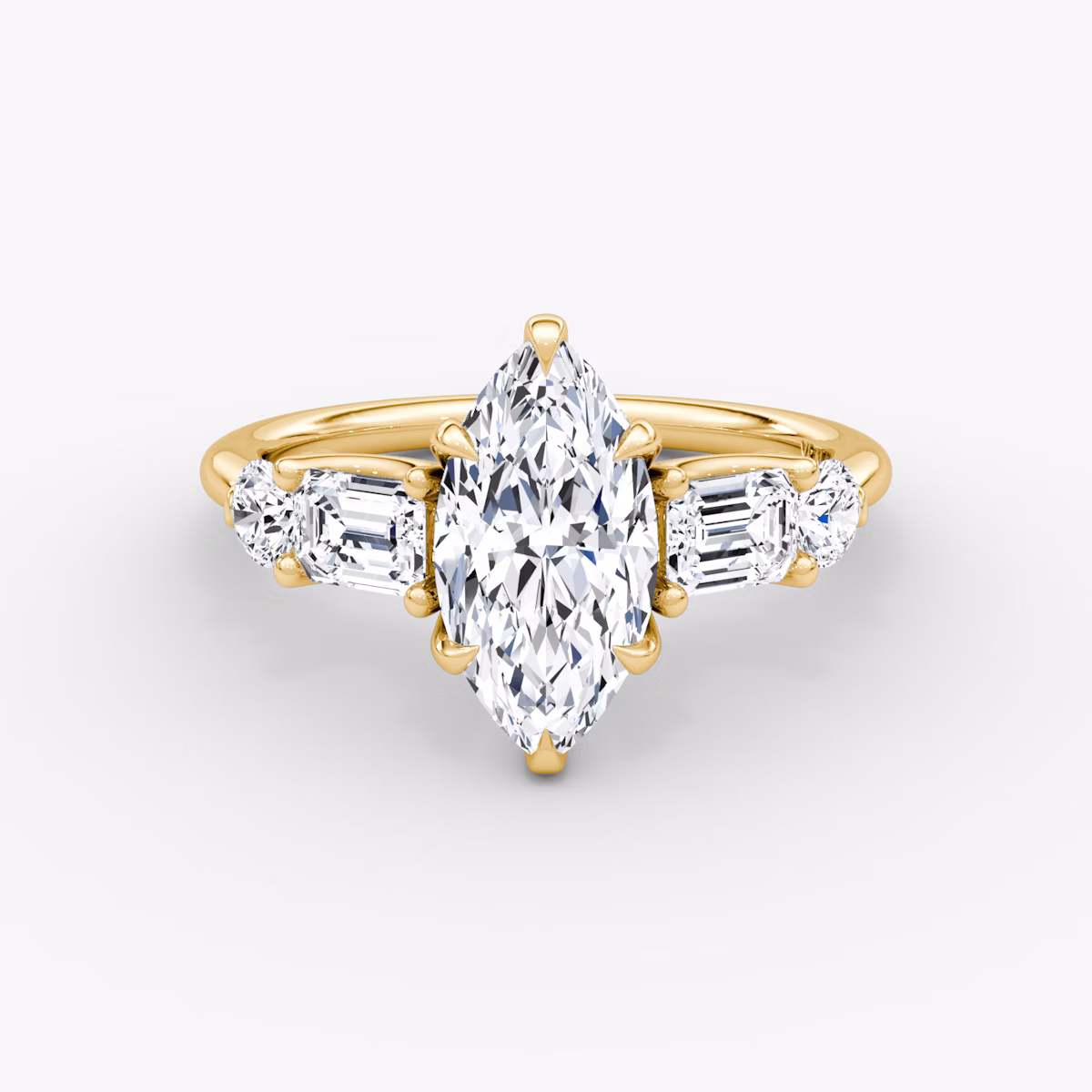 The Mixed Shape | Marquise | 18k | Yellow Gold | bandAccent: Plain | sideStoneOrientation: horizontal | sideStoneShape: Emerald and Round Brilliant | diamondOrientation: vertical | caratWeight: other