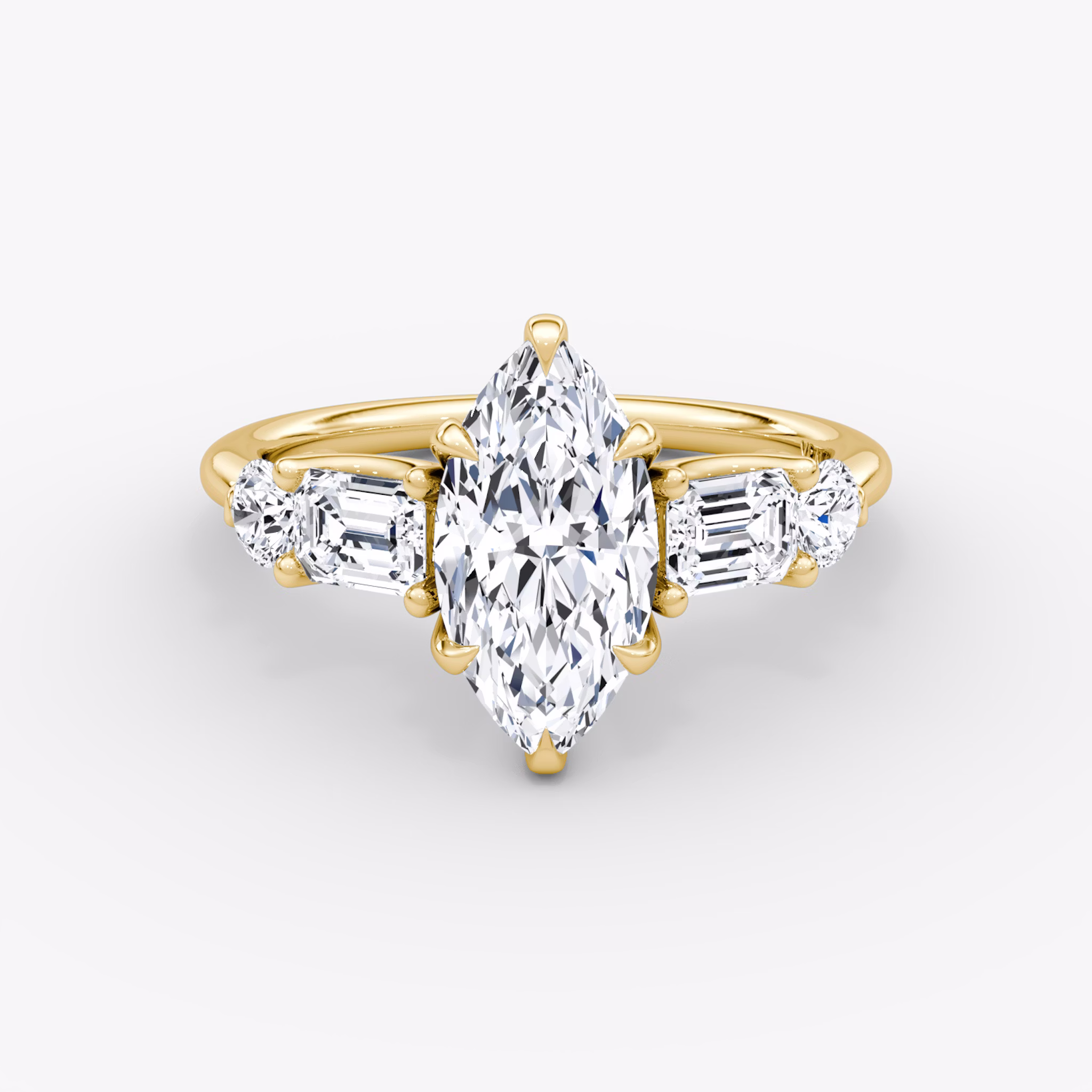 The Mixed Shape | Marquise | 18k | Yellow Gold | bandAccent: Plain | sideStoneOrientation: horizontal | sideStoneShape: Emerald and Round Brilliant | diamondOrientation: vertical | caratWeight: other