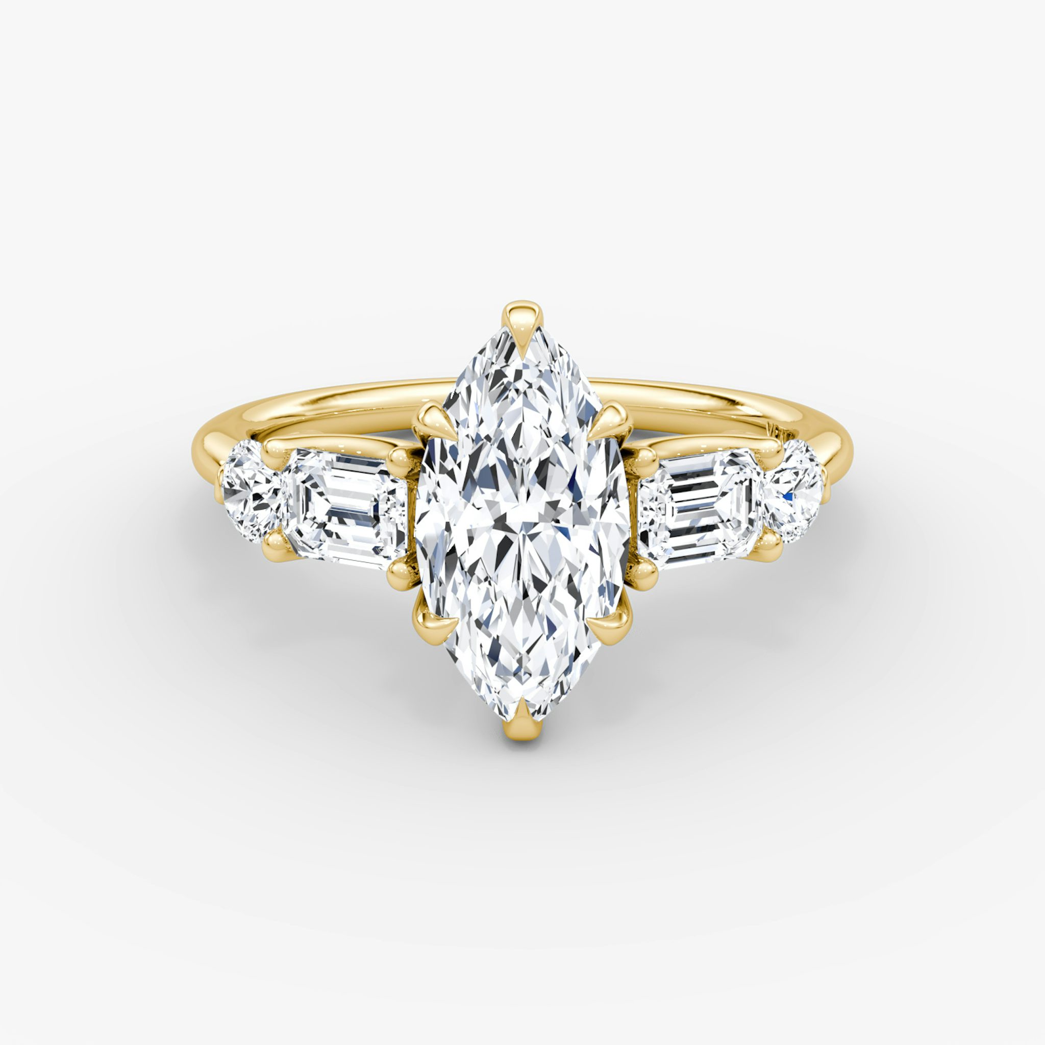 The Mixed Shape | Marquise | 18k | Yellow Gold | bandAccent: Plain | sideStoneOrientation: horizontal | sideStoneShape: Emerald and Round Brilliant | diamondOrientation: vertical | caratWeight: other
