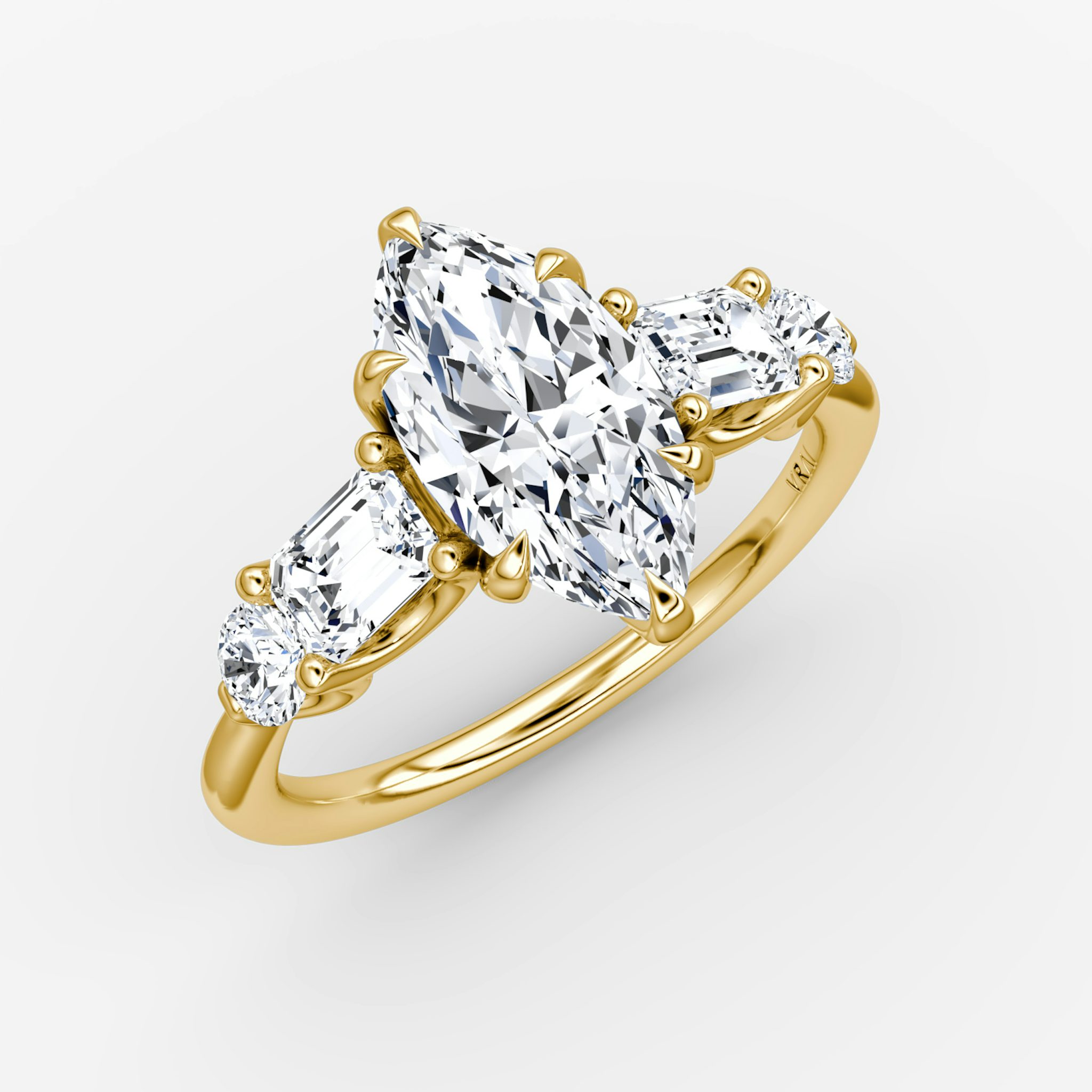 The Mixed Shape | Marquise | 18k | Yellow Gold | bandAccent: Plain | sideStoneOrientation: horizontal | sideStoneShape: Emerald and Round Brilliant | diamondOrientation: vertical | caratWeight: other