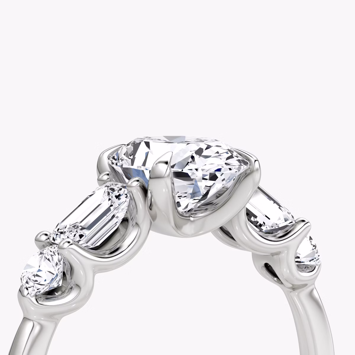The Mixed Shape | Oval | Platinum | bandAccent: Plain | sideStoneOrientation: horizontal | sideStoneShape: Emerald and Round Brilliant | diamondOrientation: vertical | caratWeight: other