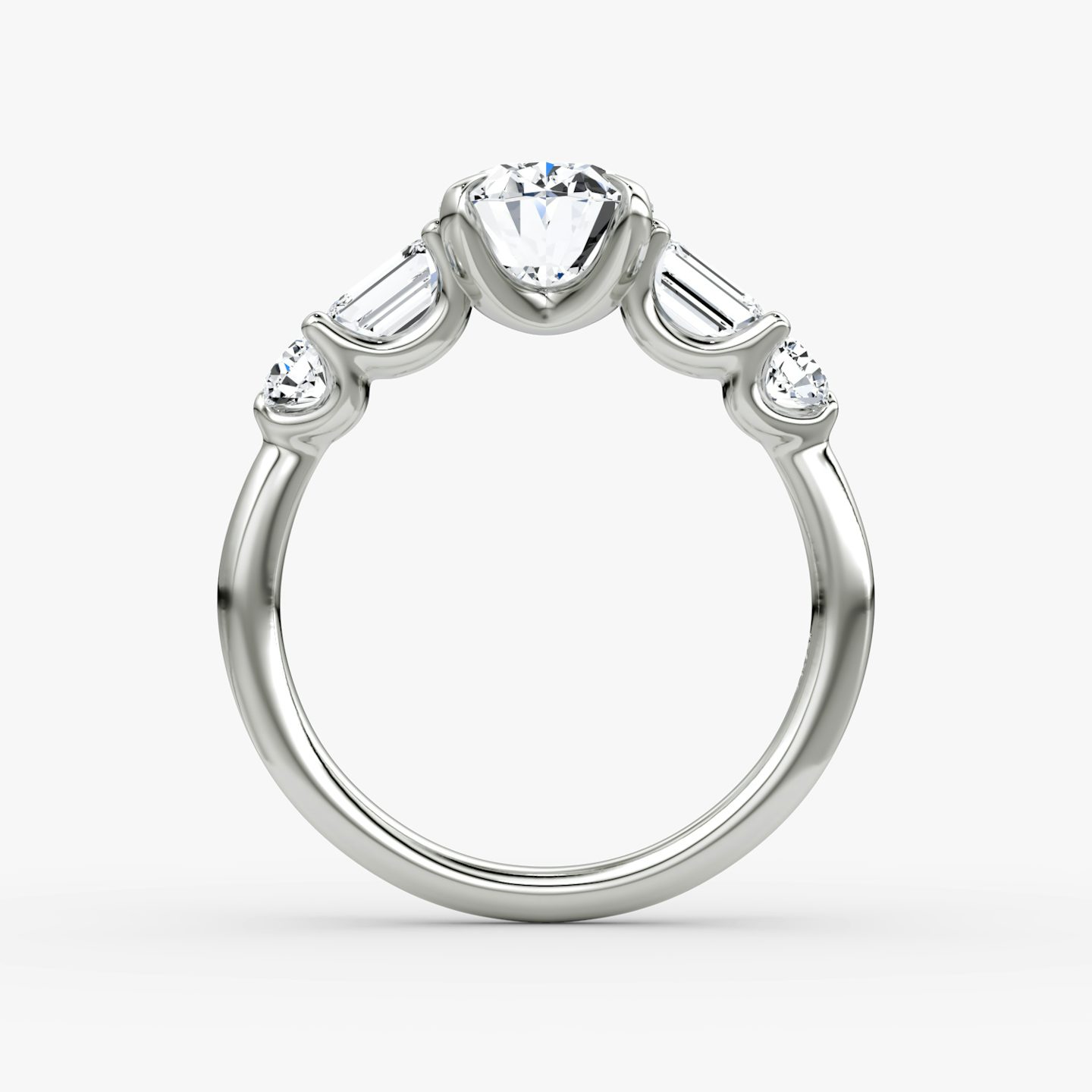 The Mixed Shape | Oval | Platinum | bandAccent: Plain | sideStoneOrientation: horizontal | sideStoneShape: Emerald and Round Brilliant | diamondOrientation: vertical | caratWeight: other