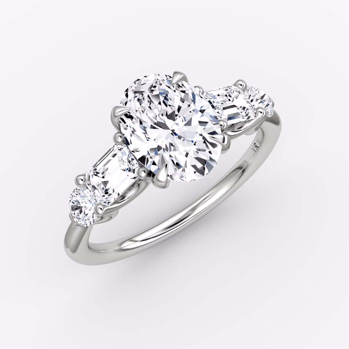 The Mixed Shape | Oval | Platinum | bandAccent: Plain | sideStoneOrientation: horizontal | sideStoneShape: Emerald and Round Brilliant | diamondOrientation: vertical | caratWeight: other