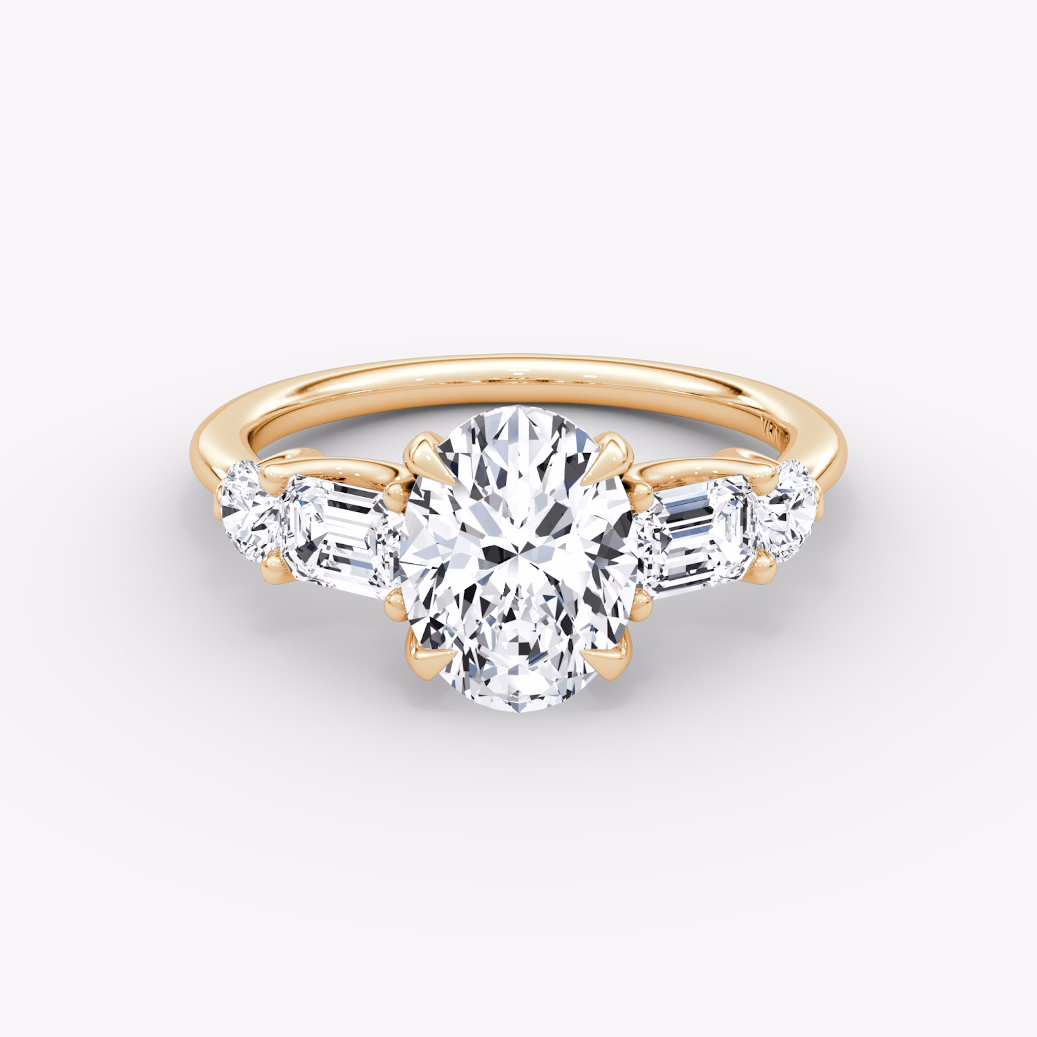 The Mixed Shape | Oval | 14k | Rose Gold | bandAccent: Plain | sideStoneOrientation: horizontal | sideStoneShape: Emerald and Round Brilliant | diamondOrientation: vertical | caratWeight: other