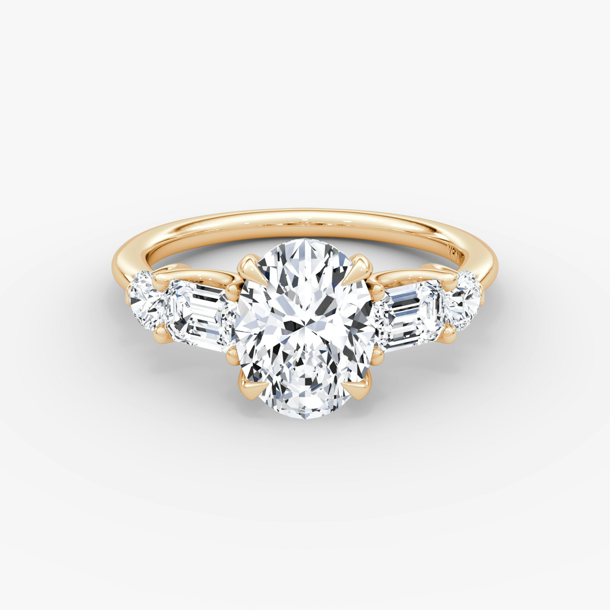 The Mixed Shape | Oval | 14k | Rose Gold | bandAccent: Plain | sideStoneOrientation: horizontal | sideStoneShape: Emerald and Round Brilliant | diamondOrientation: vertical | caratWeight: other