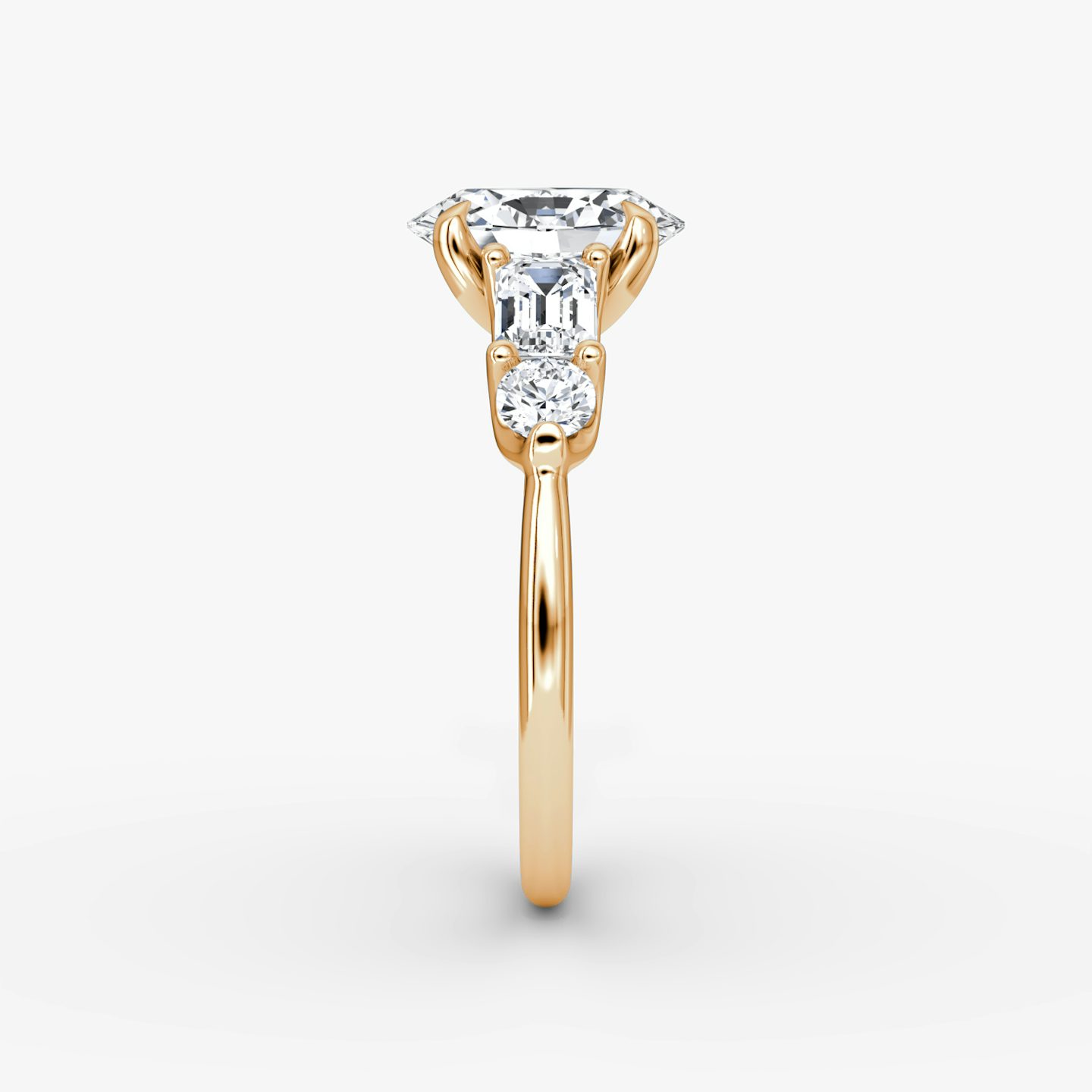 The Mixed Shape | Oval | 14k | Rose Gold | bandAccent: Plain | sideStoneOrientation: horizontal | sideStoneShape: Emerald and Round Brilliant | diamondOrientation: vertical | caratWeight: other