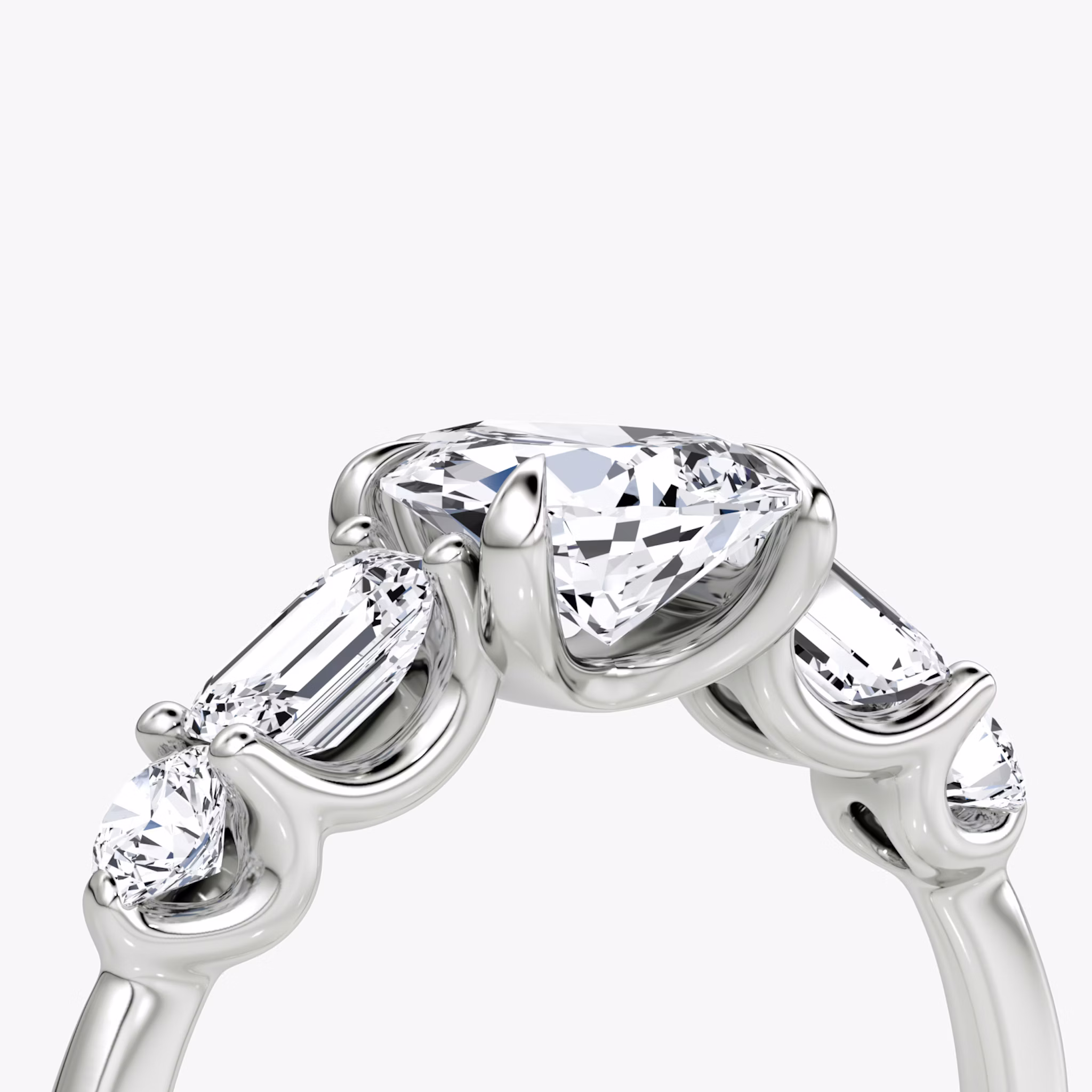 The Mixed Shape | Pear | 18k | White Gold | bandAccent: Plain | sideStoneOrientation: horizontal | sideStoneShape: Emerald and Round Brilliant | diamondOrientation: vertical | caratWeight: other