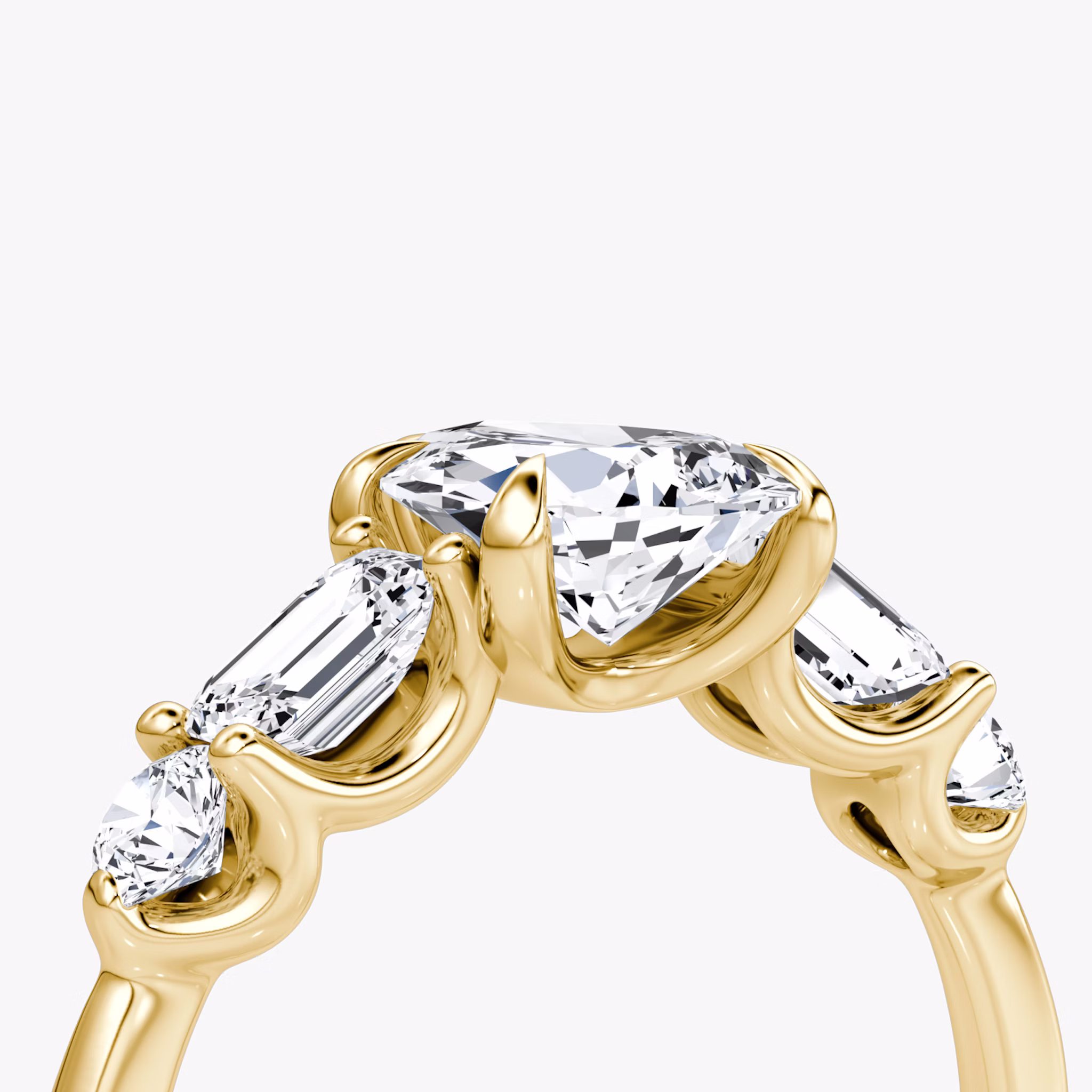 The Mixed Shape | Pear | 18k | Yellow Gold | bandAccent: Plain | sideStoneOrientation: horizontal | sideStoneShape: Emerald and Round Brilliant | diamondOrientation: vertical | caratWeight: other