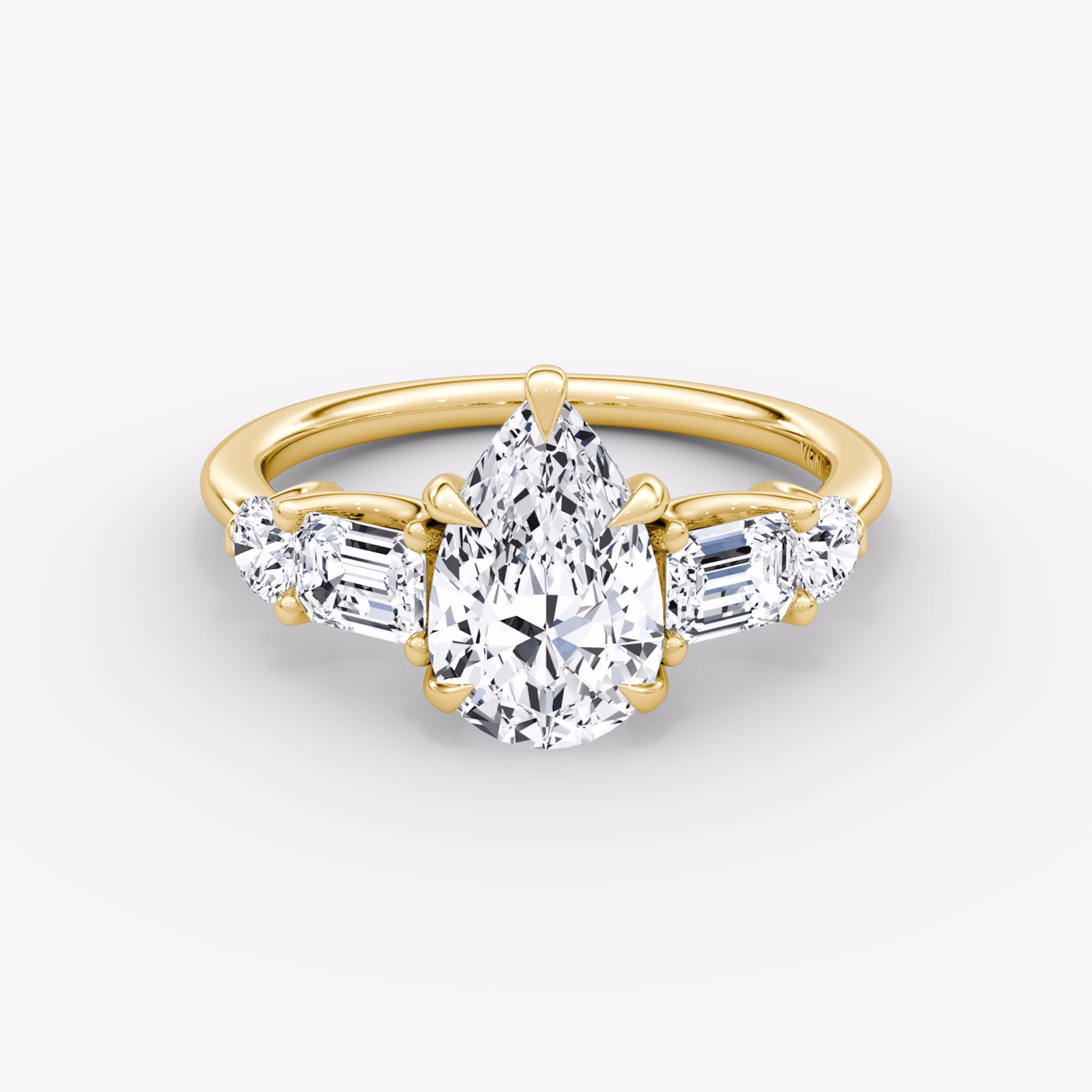 The Mixed Shape | Pear | 18k | Yellow Gold | bandAccent: Plain | sideStoneOrientation: horizontal | sideStoneShape: Emerald and Round Brilliant | diamondOrientation: vertical | caratWeight: other