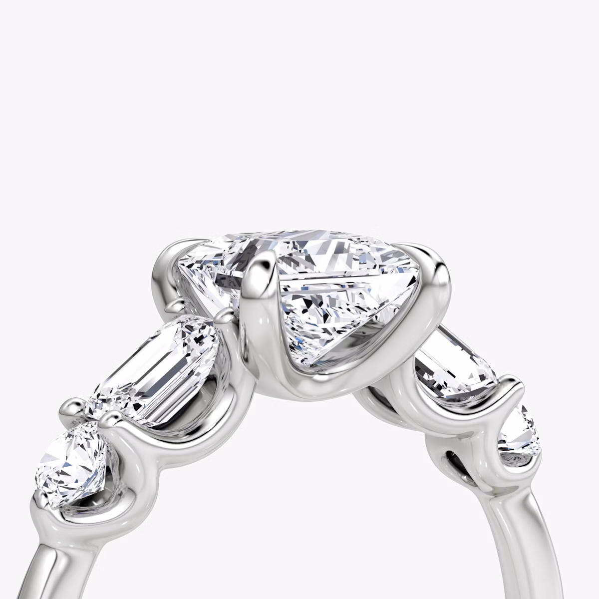 The Mixed Shape | Princess | Platinum | bandAccent: Plain | sideStoneOrientation: horizontal | sideStoneShape: Emerald and Round Brilliant | diamondOrientation: vertical | caratWeight: other