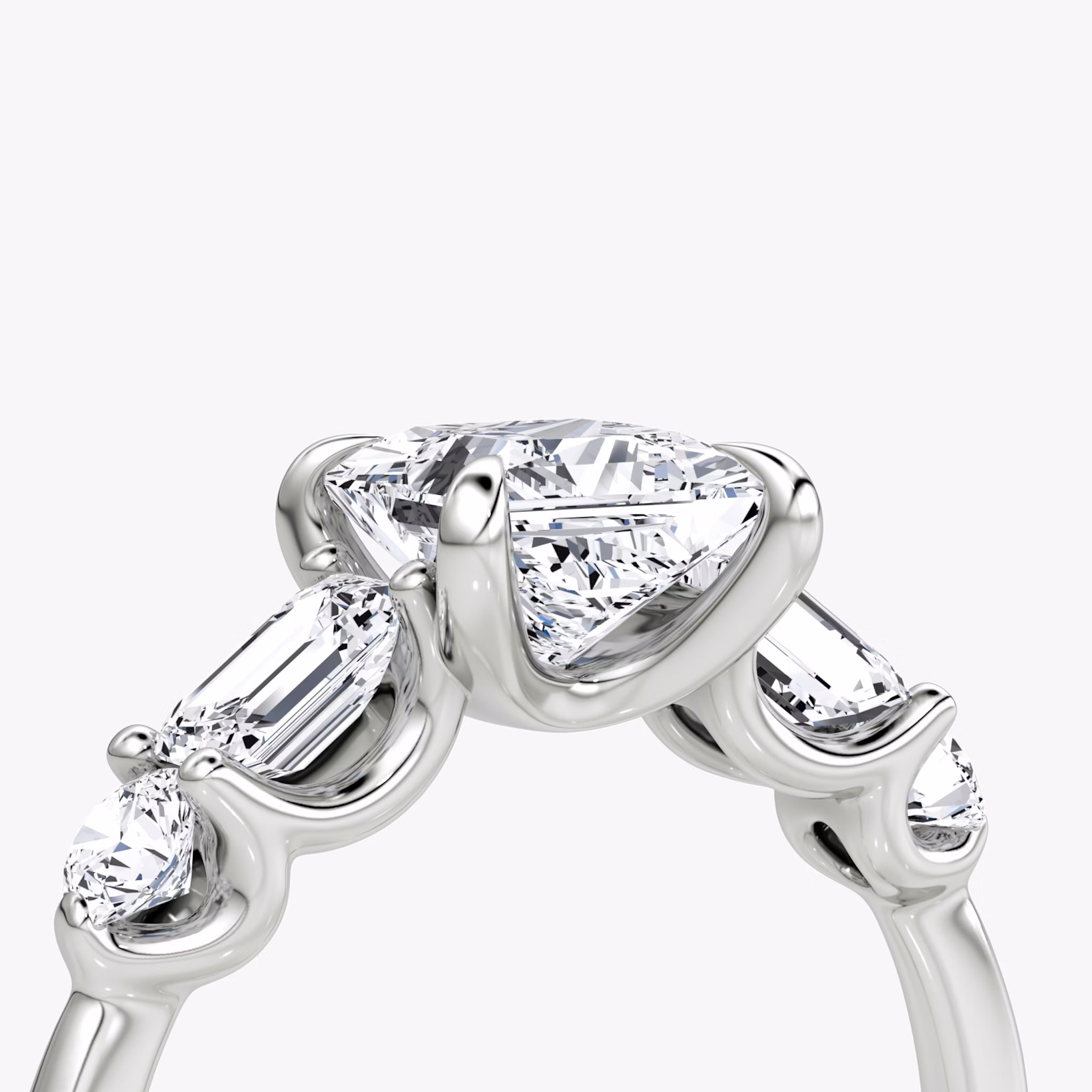 The Mixed Shape | Princess | 18k | White Gold | bandAccent: Plain | sideStoneOrientation: horizontal | sideStoneShape: Emerald and Round Brilliant | diamondOrientation: vertical | caratWeight: other