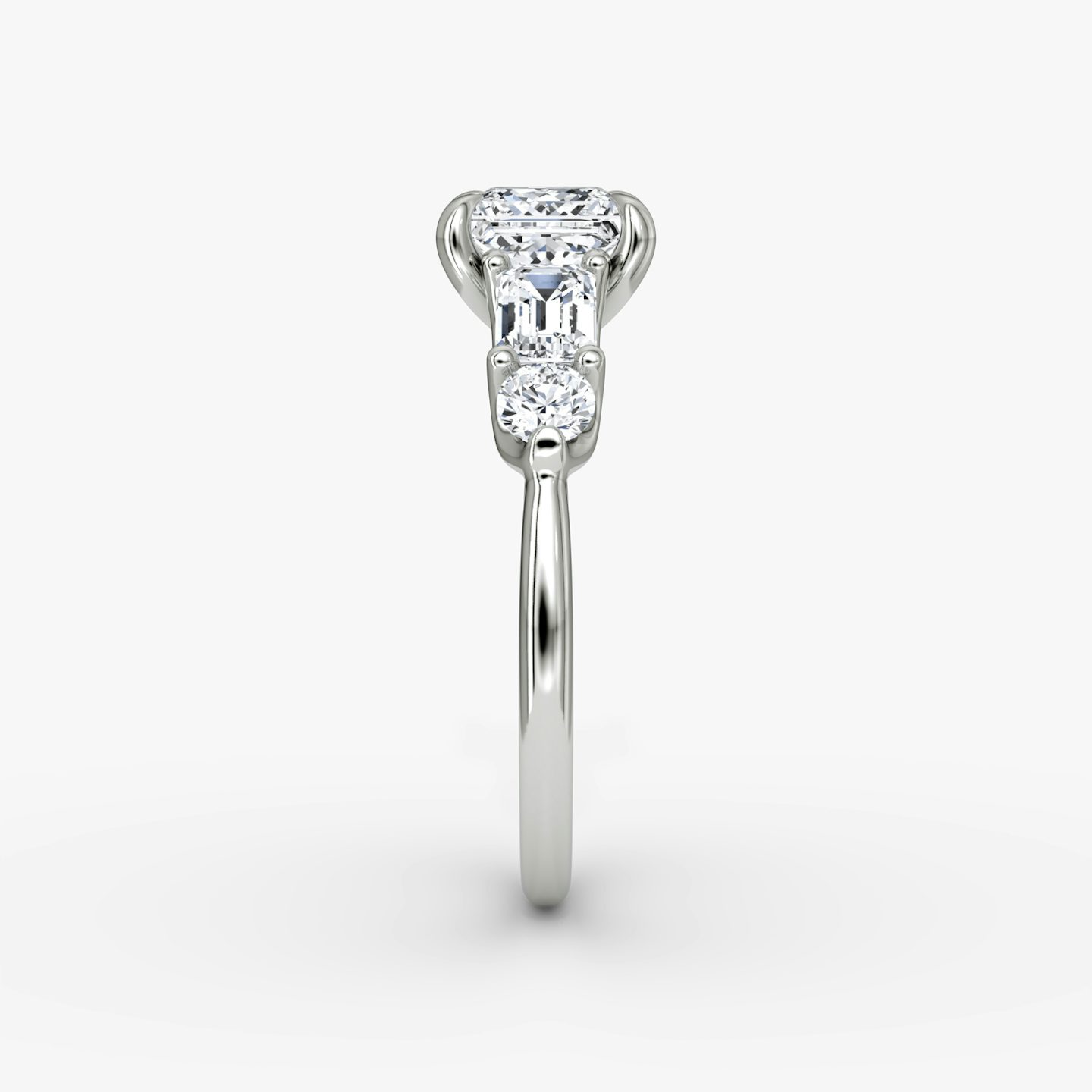 The Mixed Shape | Princess | Platinum | bandAccent: Plain | sideStoneOrientation: horizontal | sideStoneShape: Emerald and Round Brilliant | diamondOrientation: vertical | caratWeight: other
