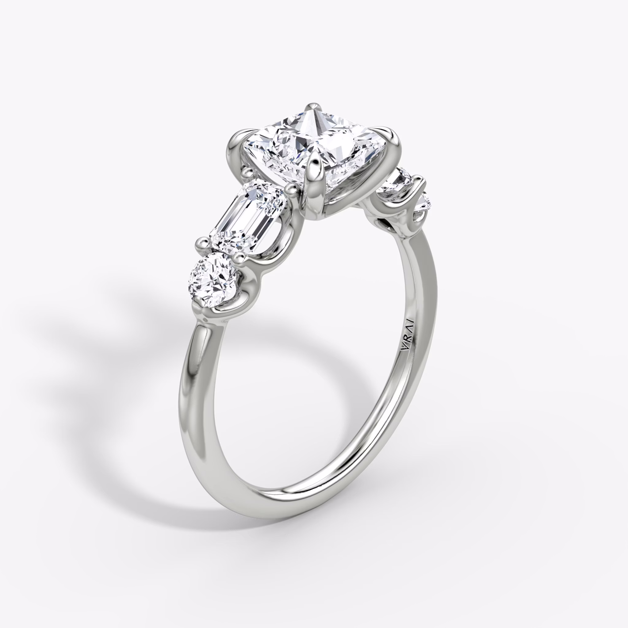 The Mixed Shape | Princess | 18k | White Gold | bandAccent: Plain | sideStoneOrientation: horizontal | sideStoneShape: Emerald and Round Brilliant | diamondOrientation: vertical | caratWeight: other